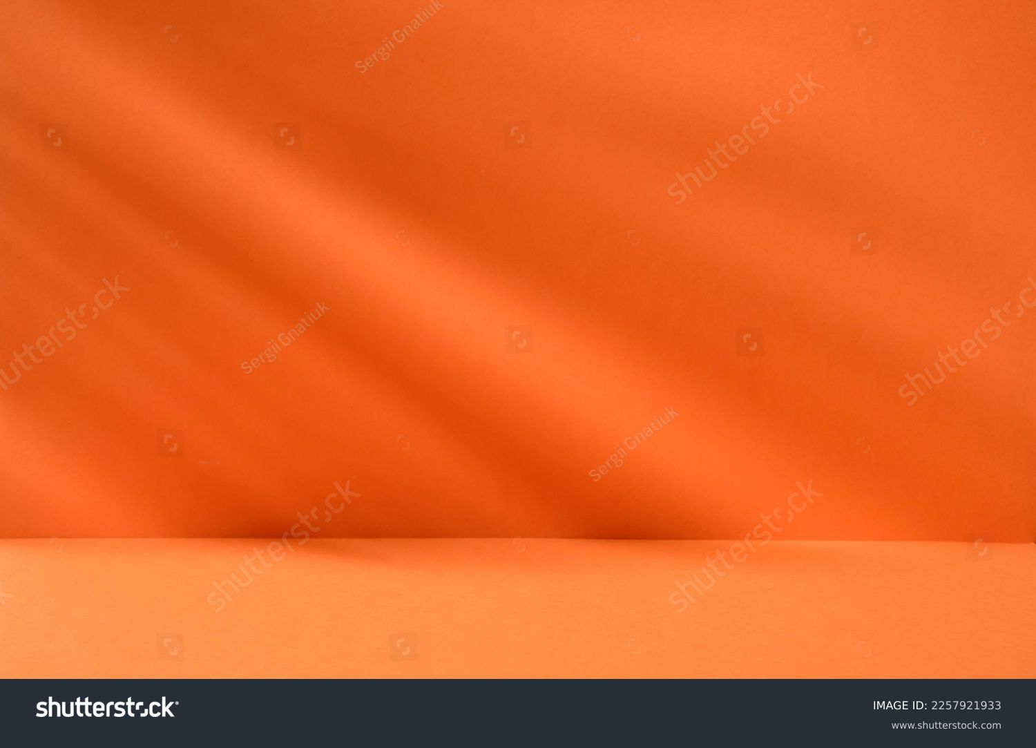 Bright orange background with plant shadows for product or cosmetics. High quality photo #2257921933