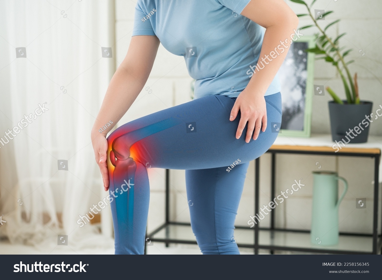 Knee pain, woman suffering from osteoarthritis at home, chiropractic treatments concept, BeH3althy #2258156345