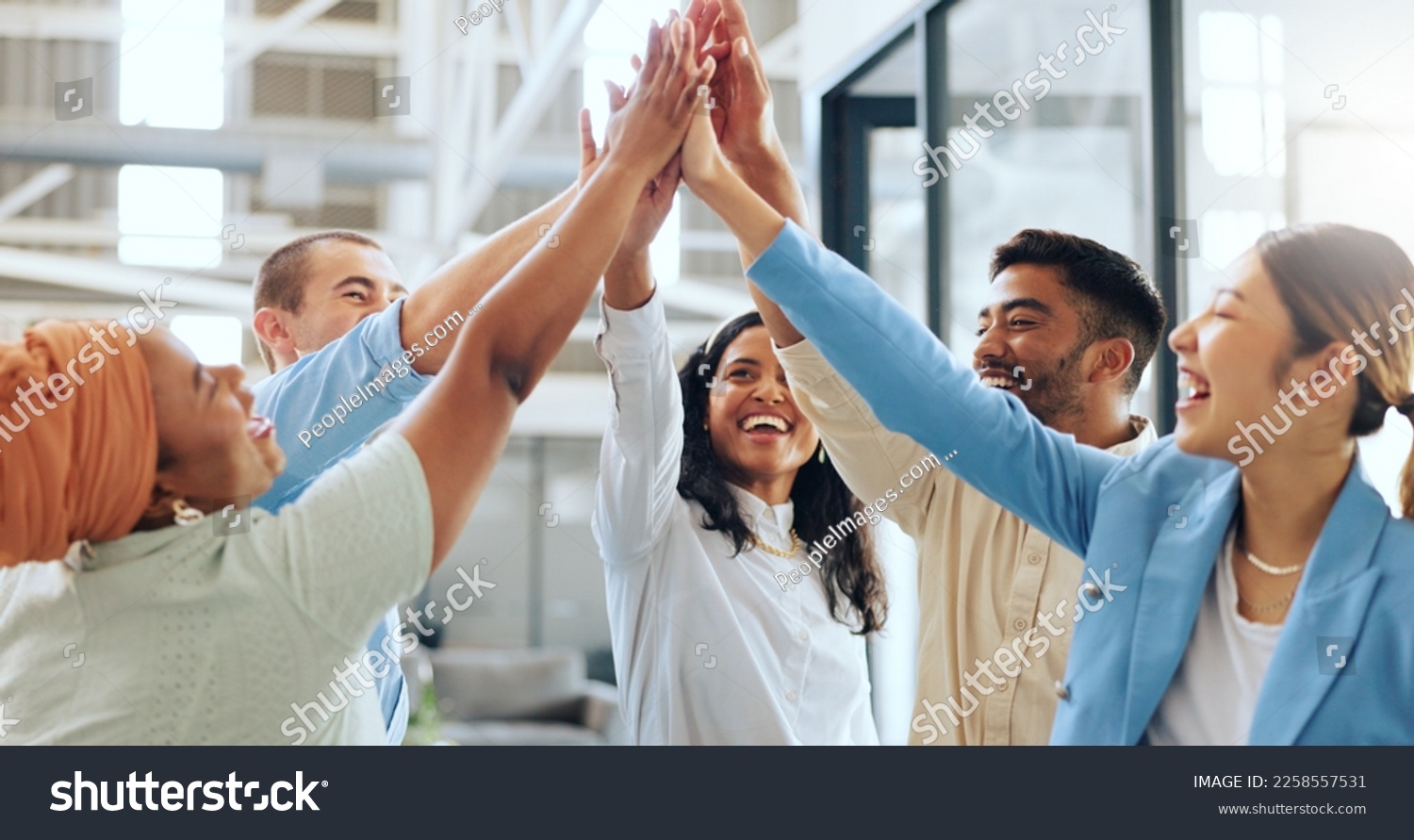 Business people, diversity or high five in teamwork success, advertising goals or team building in marketing modern office. Smile, happy or collaboration hands gesture, creative designer men or women #2258557531