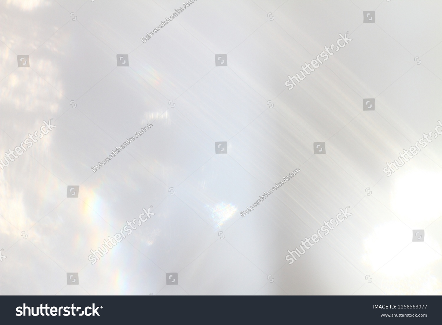 Abstract background - light flashes on grey background. #2258563977