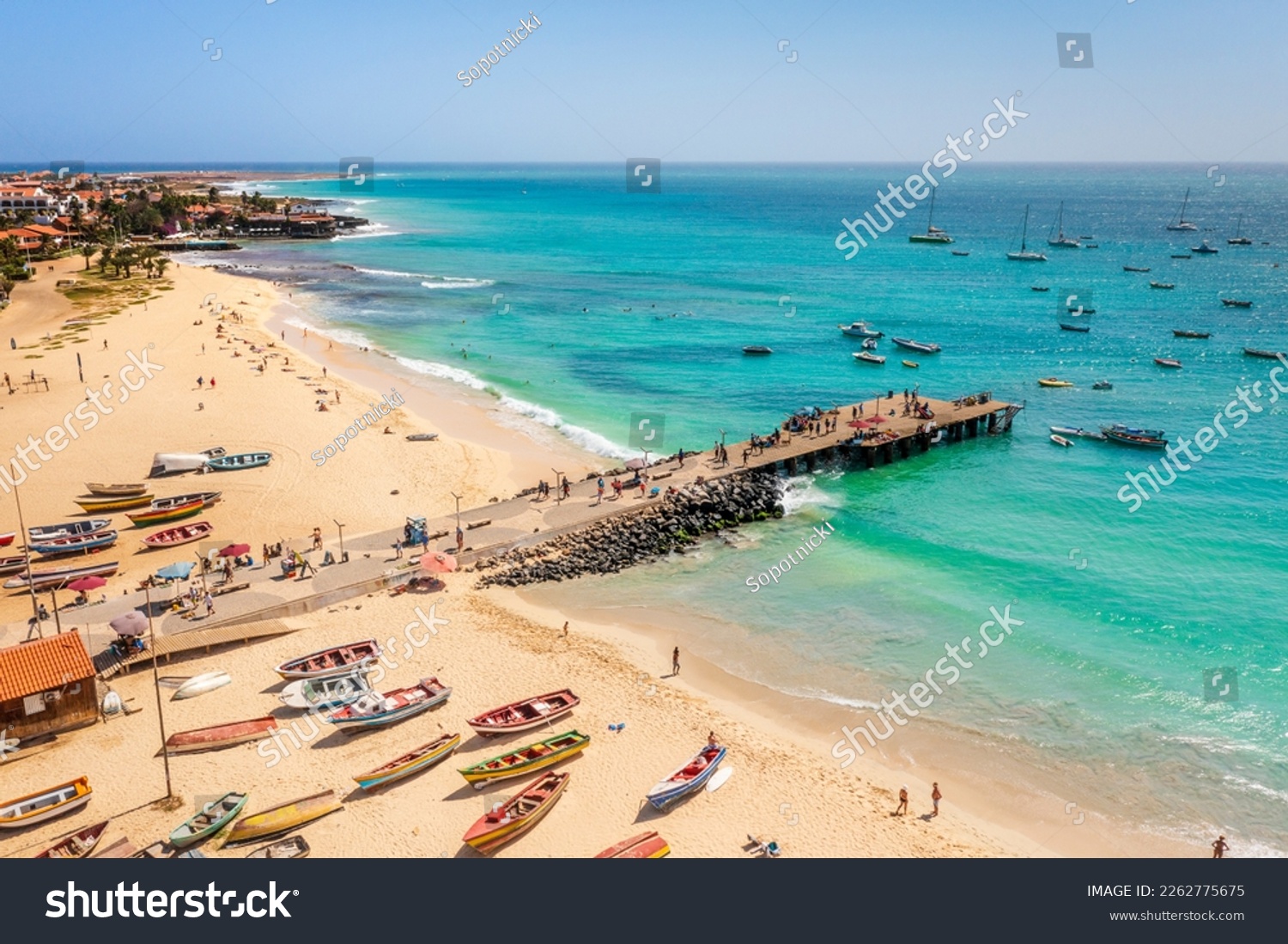 Pier and boats on turquoise water in city of Santa Maria, island of Sal, Cape Verde #2262775675