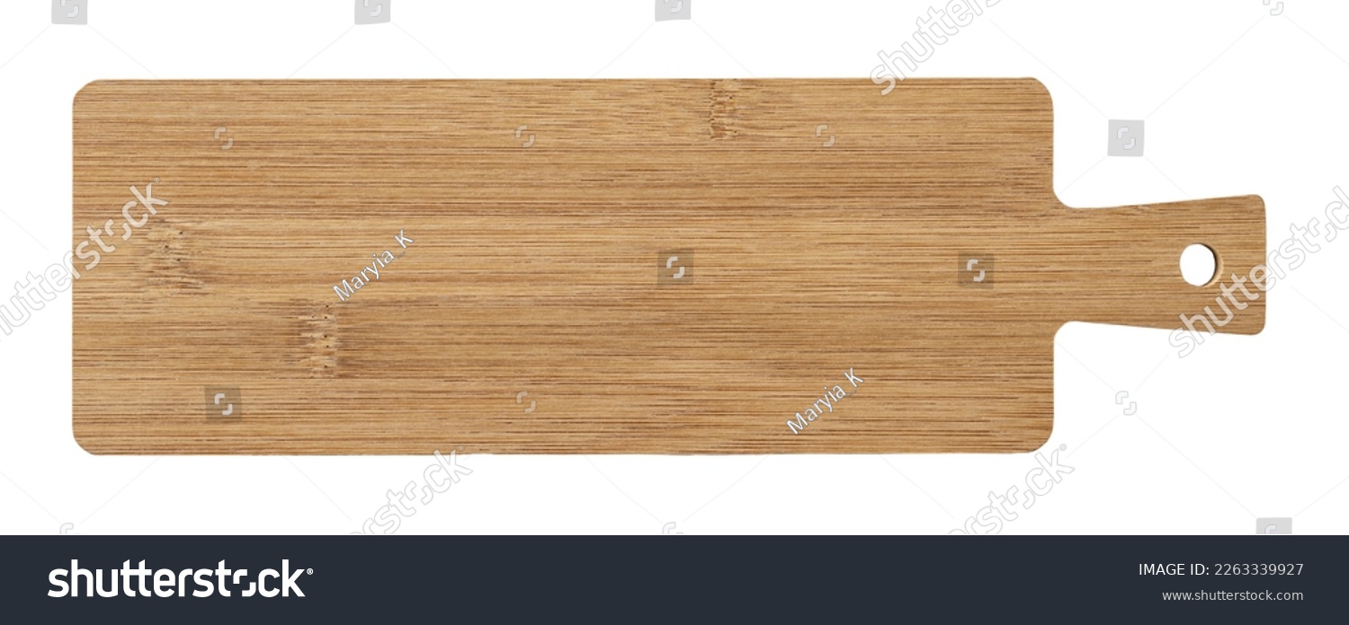 Long serving board cutout. Empty bamboo board with handle for serving food isolated on a white background. Modern kitchen utensil made of wood for food design. Cutting board. Top view. #2263339927