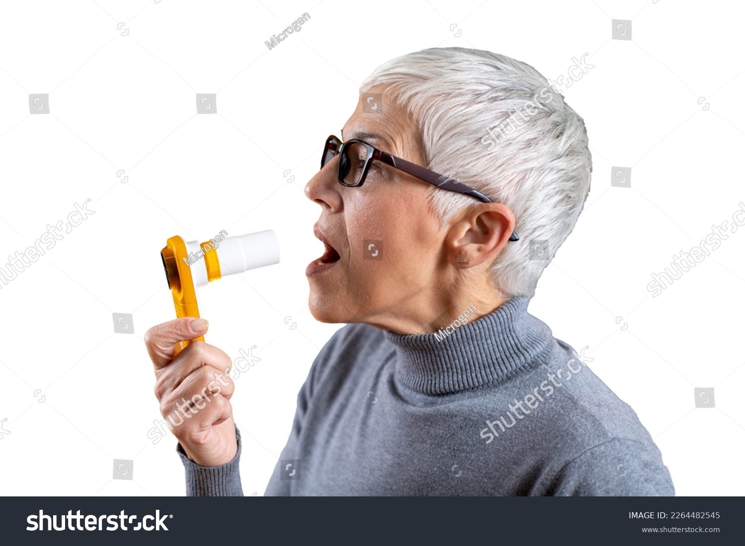 Senior Woman using Spirometer. Isolated, Transparent Background #2264482545