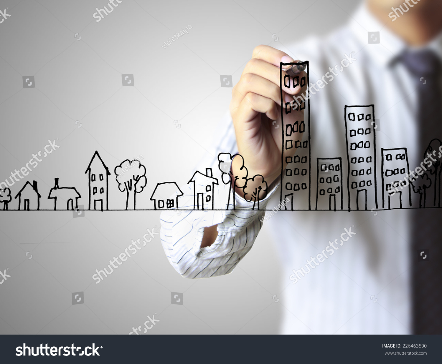 Real estate, Business man drawing a house  #226463500