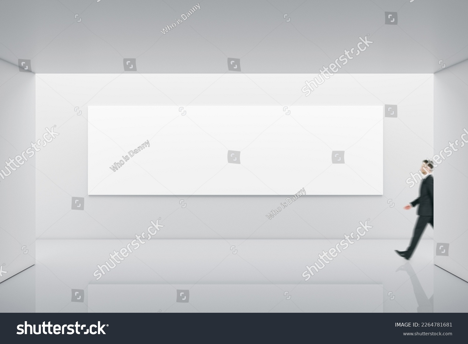 Businessman walking by long white blank poster with place for your logo or text on light illuminated wall background in abstract empty exhibition hall, mock up #2264781681