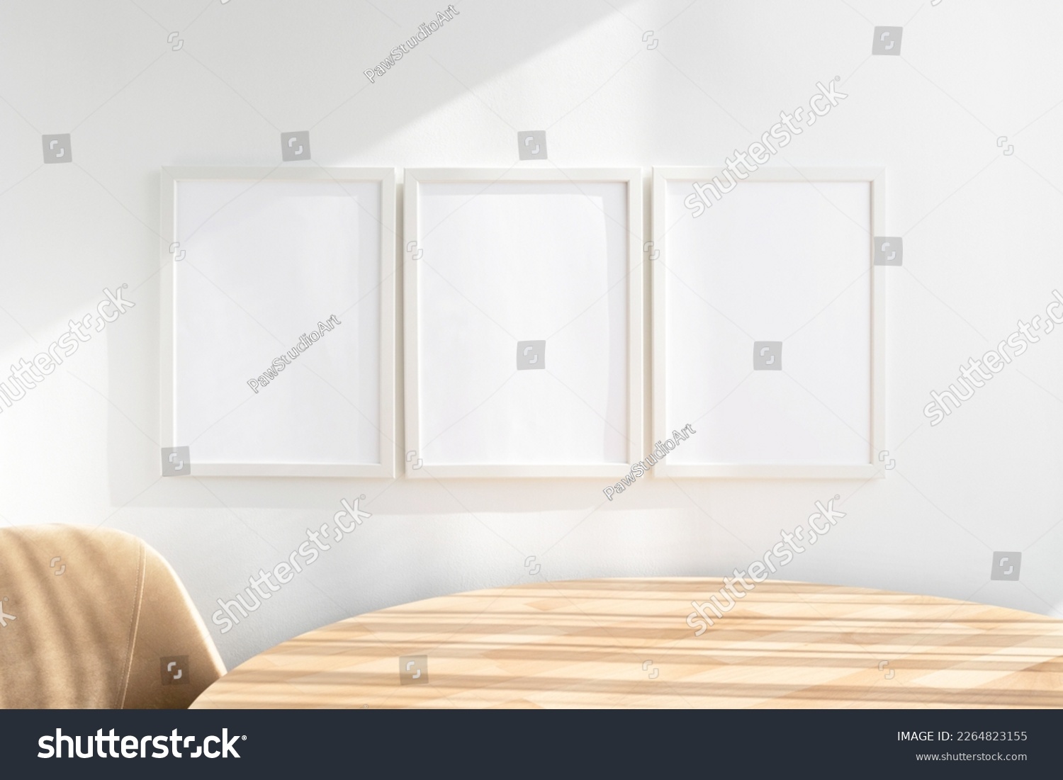 3 white frame mockups near wooden table #2264823155