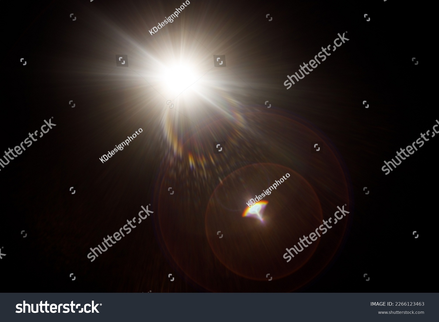 Easy to add lens flare effects for overlay designs or screen blending mode to make high-quality images. Abstract sun burst, digital flare, iridescent glare over black background. #2266123463