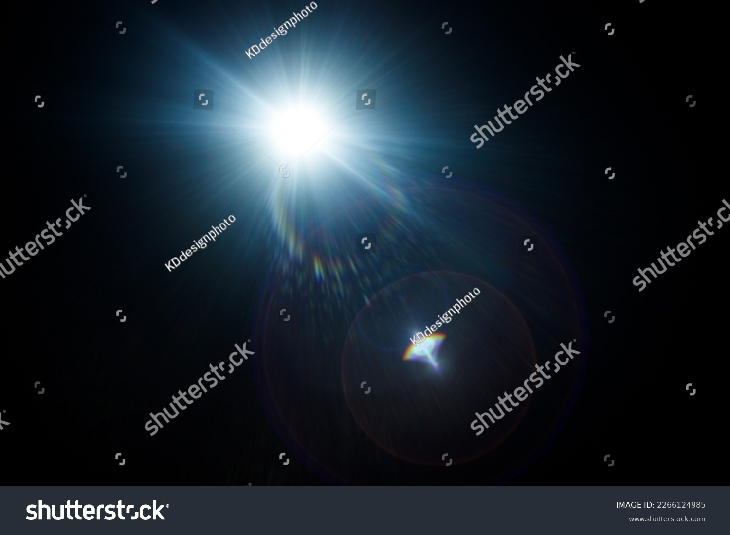 Easy to add lens flare effects for overlay designs or screen blending mode to make high-quality images. Abstract sun burst, digital flare, iridescent glare over black background. #2266124985