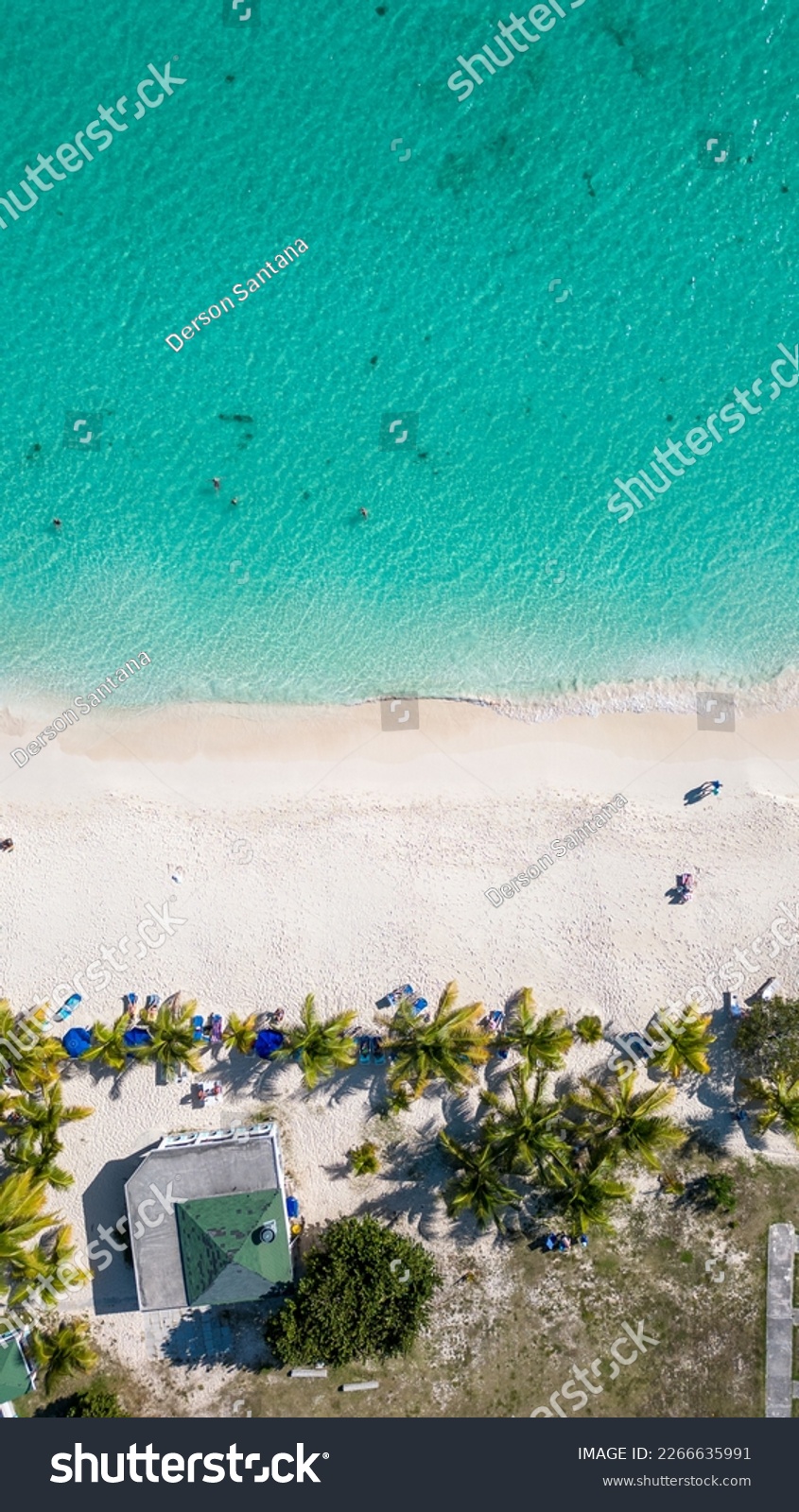 Rendezvous bay, Anguilla. Paradise beach on the British Caribbean Sea. Turquoise blue water with fine white sand. Beautiful sunny day with few clouds. Drone Top View. #2266635991