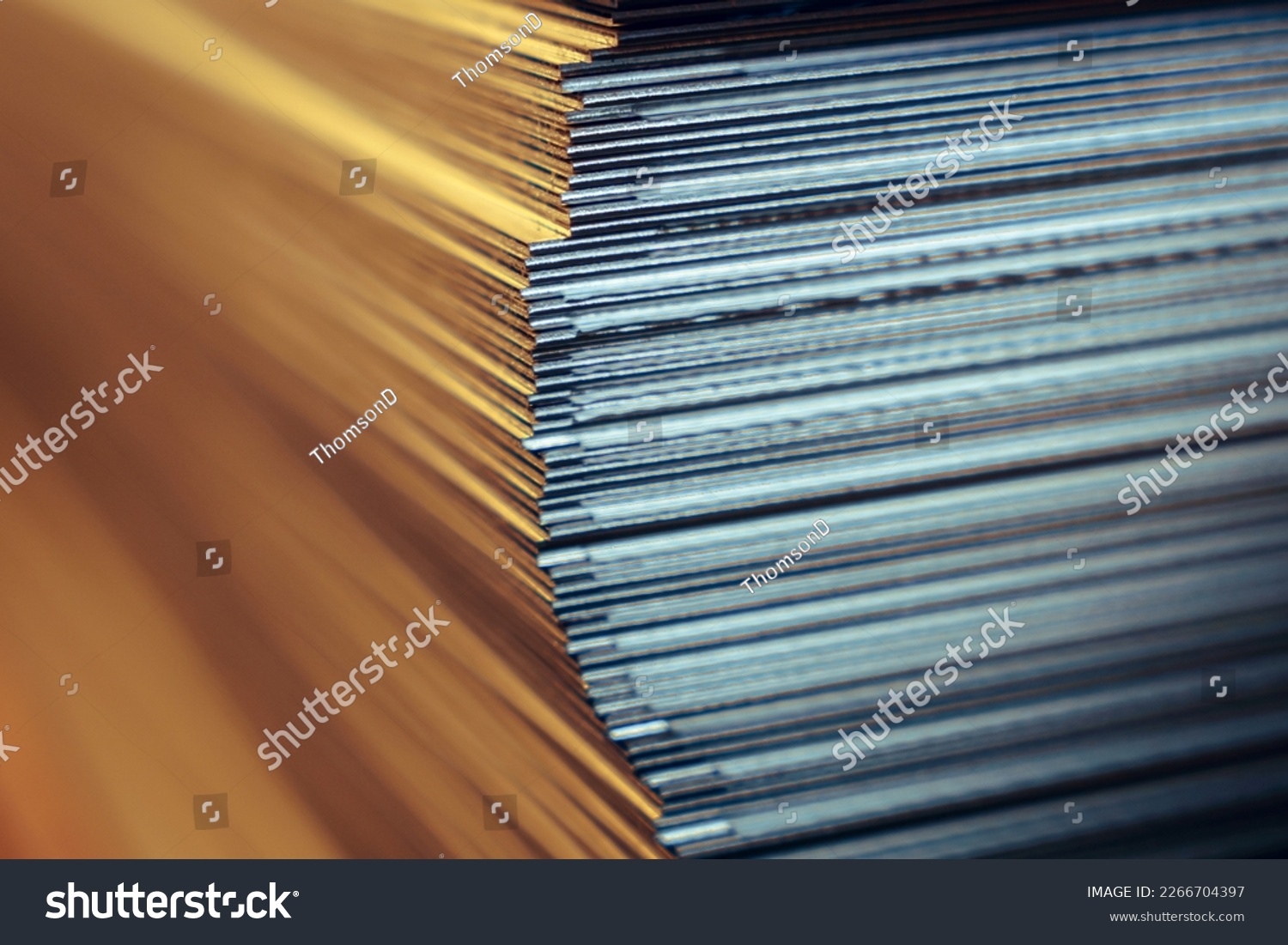 Sheets of metal in a stack in a warehouse #2266704397