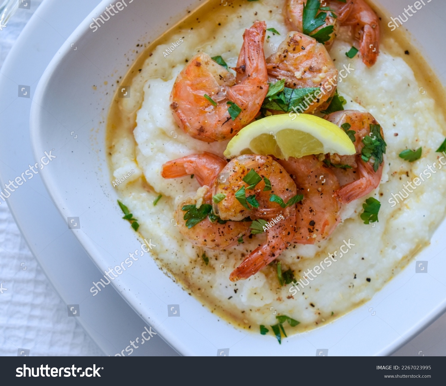 Rich flavors of the South creamy, buttery grits succulent shrimp and a flavorful broth. South Carolina style Southern hospitality, Southern food, nola food, New Orleans, Cajun #2267023995