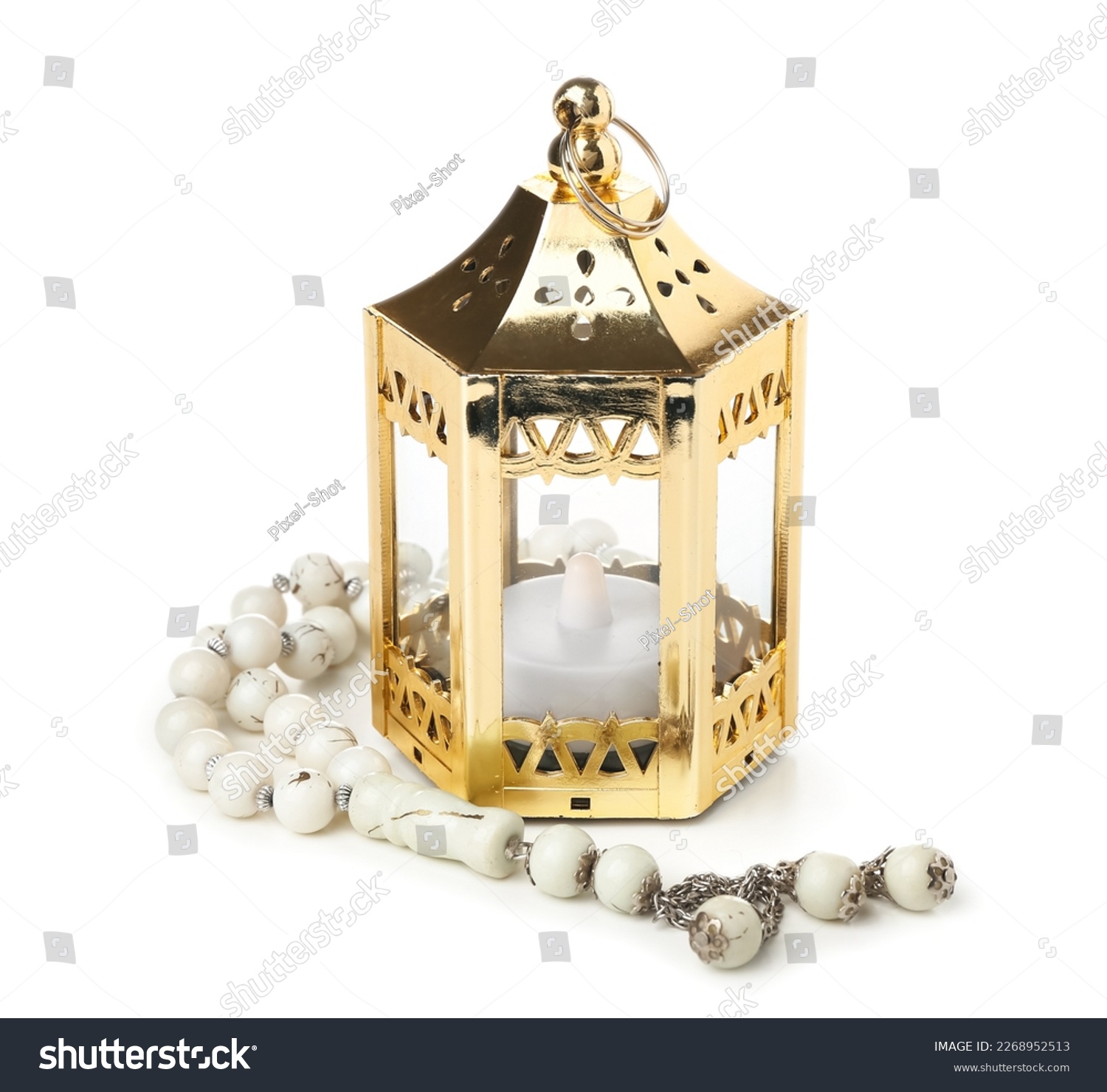 Muslim lantern with candle and prayer beads for Ramadan on white background #2268952513