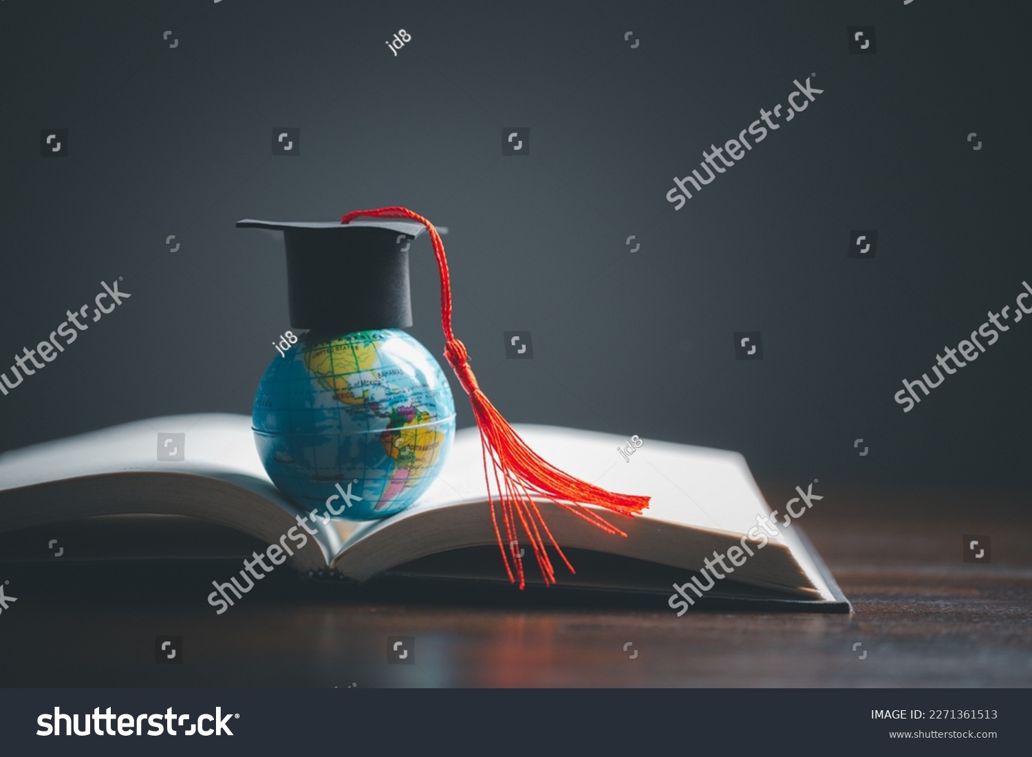 Graduation cap with Earth globe. Concept of global business study, abroad educational, Back to School. Education in Global world, Study abroad business in universities in worldwide. language study #2271361513