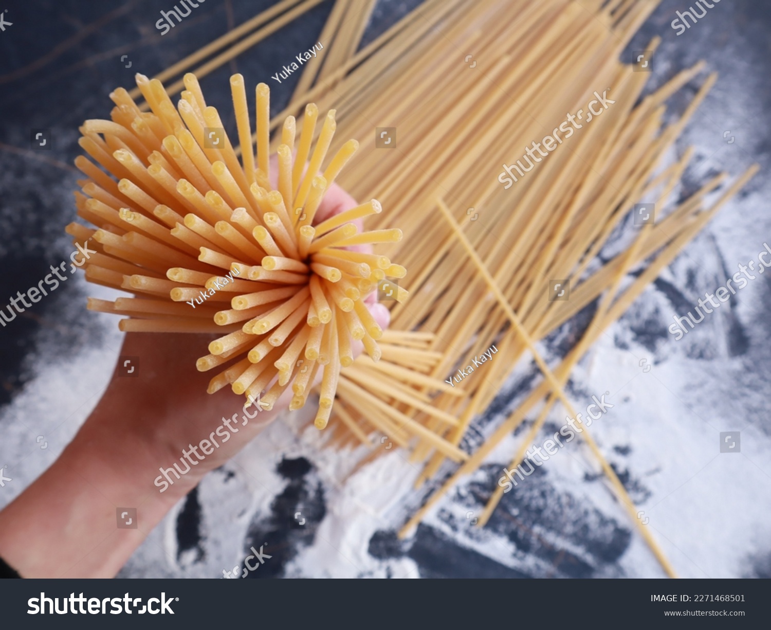 First person shoot of bucatini pasta. ingredients of typical italian cuisine. #2271468501