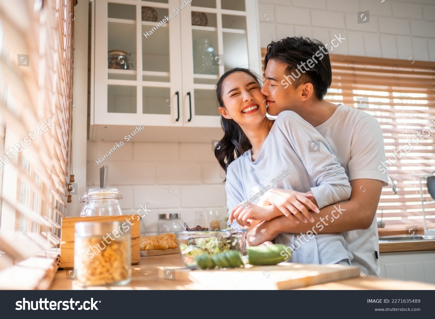 Asian young new marriage couple spend time together in kitchen at home. Attractive man and woman feeling happy and relax, enjoy cooking foods for breakfast with happiness. Family relationship concept. #2271635489