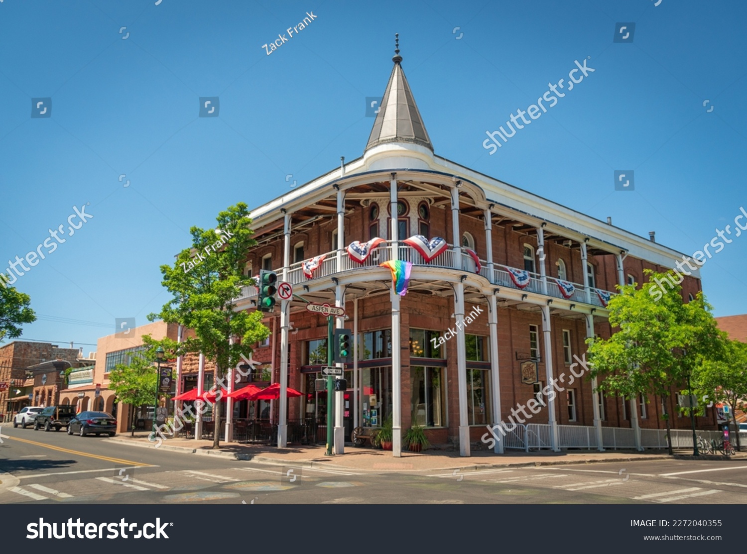 Festive building at Flagstaff, Arizona with American and LGBT flags. #2272040355