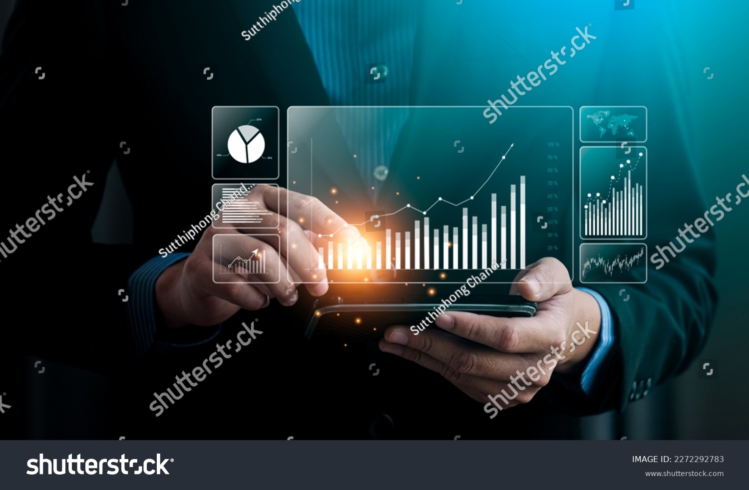 Businessman analyzing business enterprise data management, Business analytics with charts, metrics and KPIs to performance organization. Corporate strategy for finance, operations, sales, marketing #2272292783