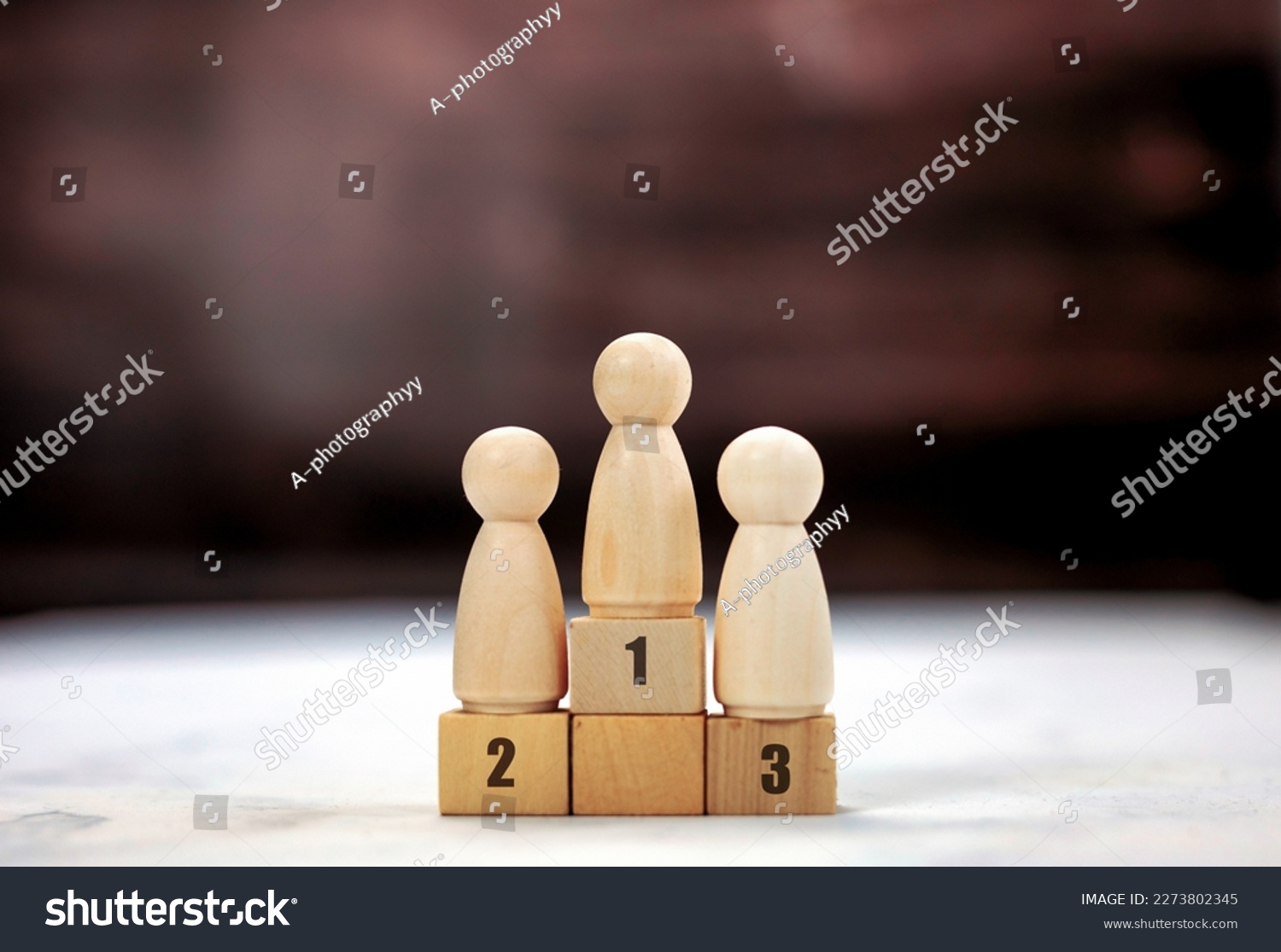 Achievement concept. Wooden podium 1, 2, 3, human standing on podium with ranking winner business and sport competition concept copy space space for text #2273802345