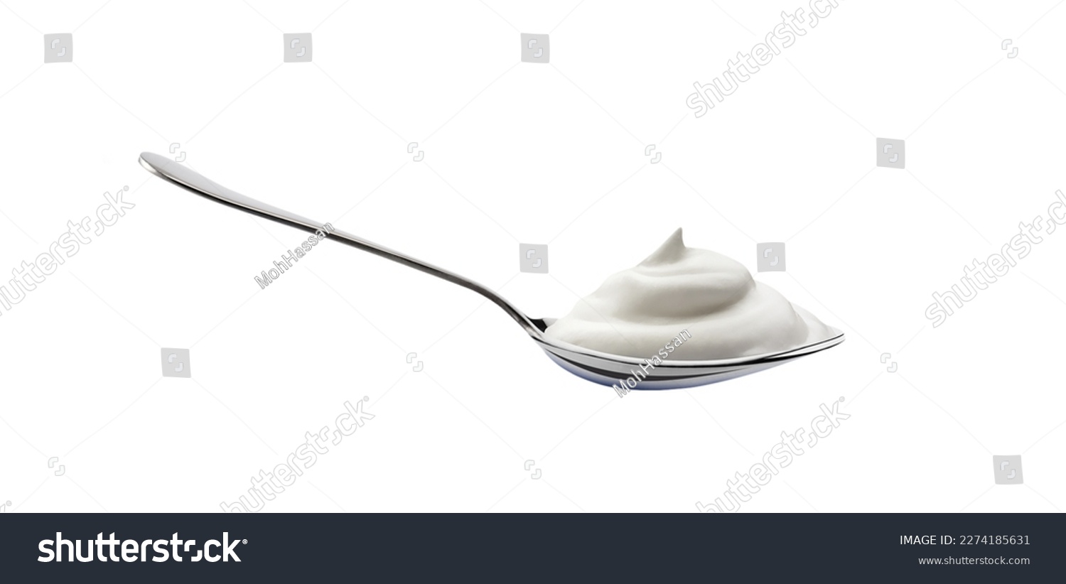 Yogurt spoon with creamy texture isolated #2274185631