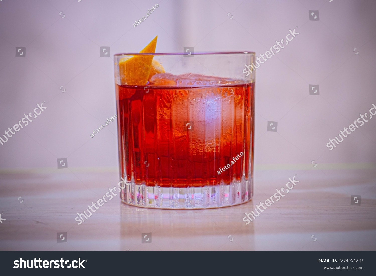 Refreshing negroni drink in elegant glass #2274554237