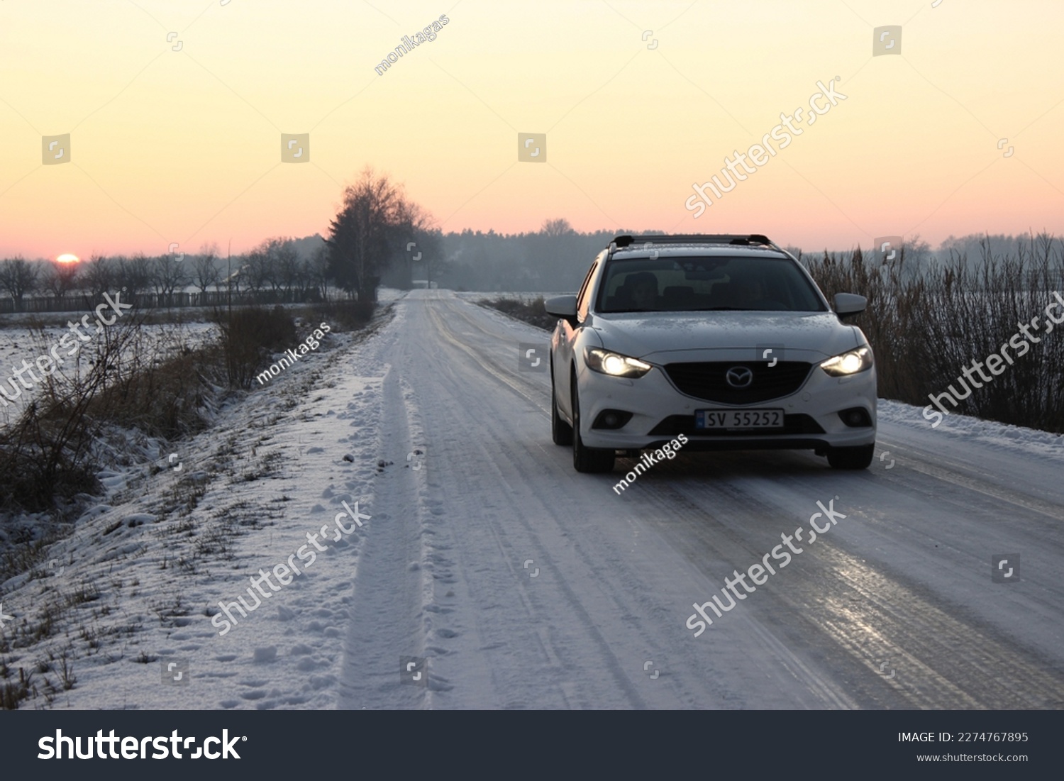 car during the sunset. polish nature arround, frost, snow and ice. #2274767895