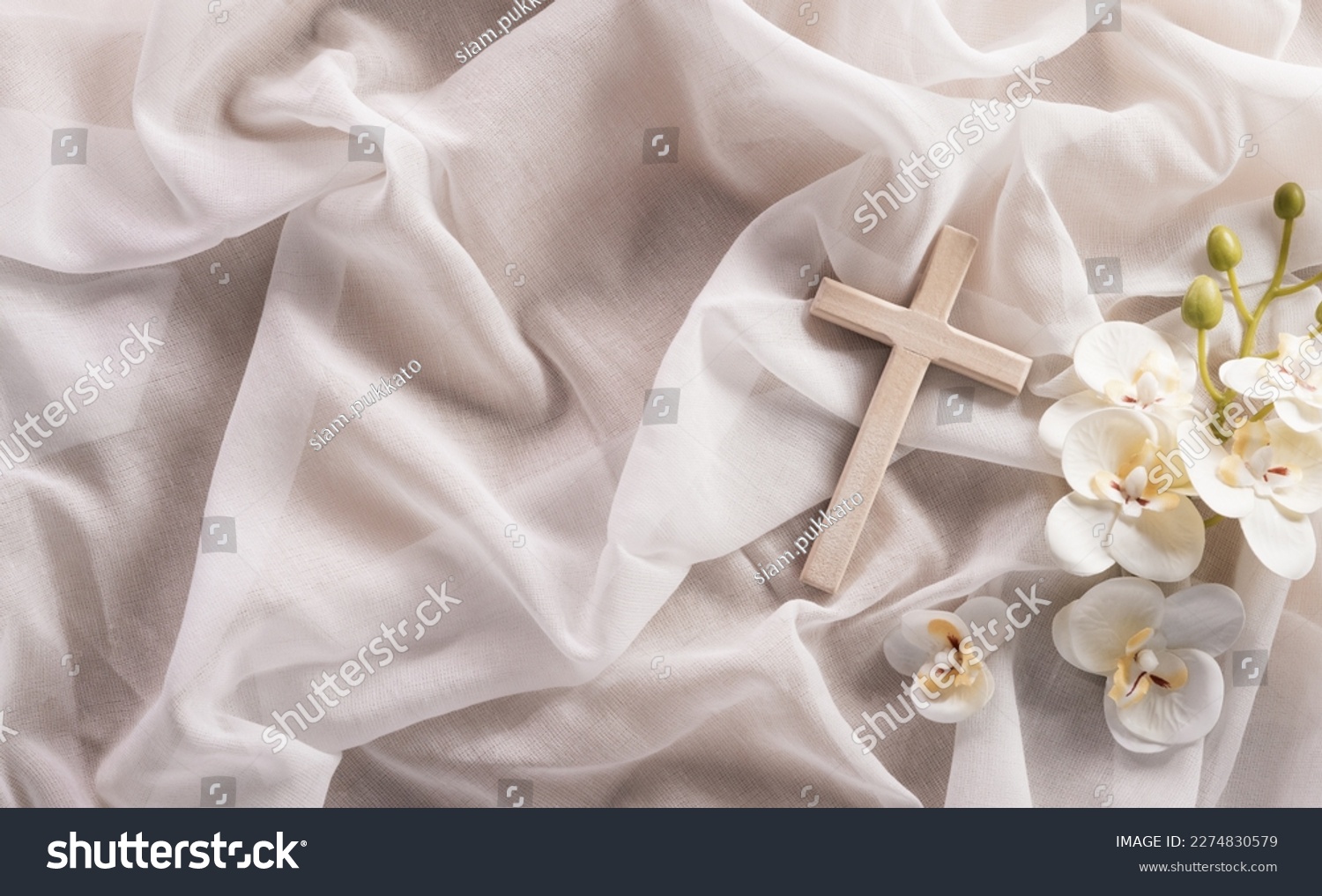 Good Friday and Holy week concept - A religious cross and flower on white fabric background. #2274830579