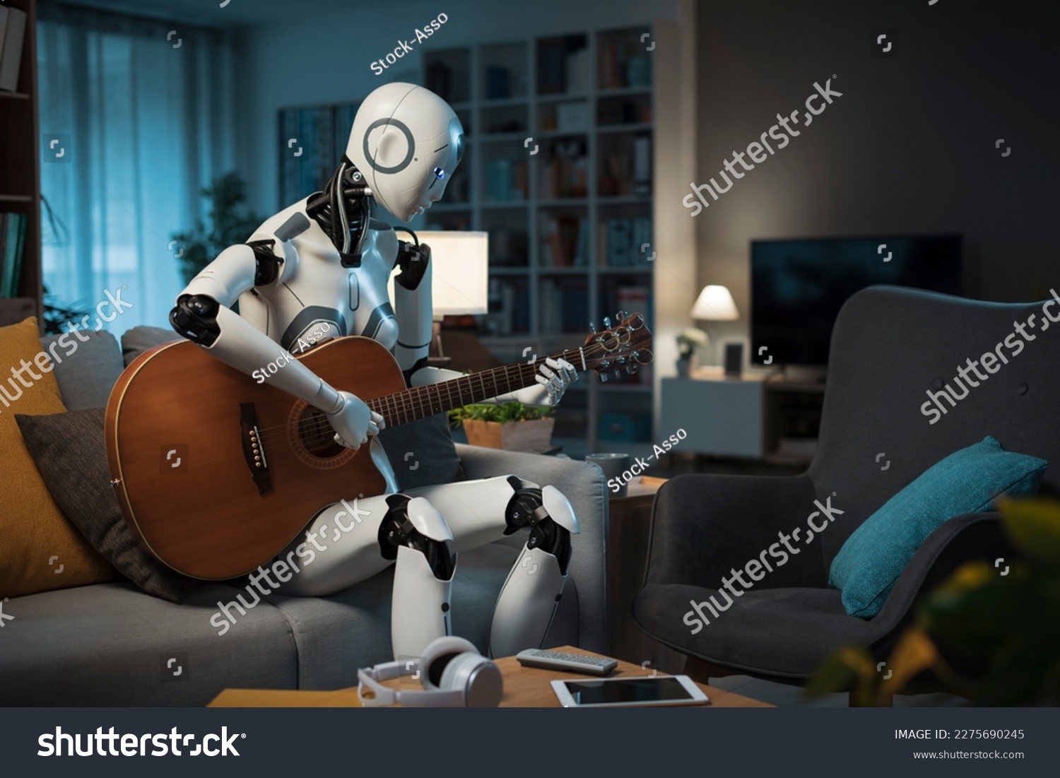 A Robot equipped with A.I. practices playing the guitar. He learns quickly, and is very skillful. #2275690245