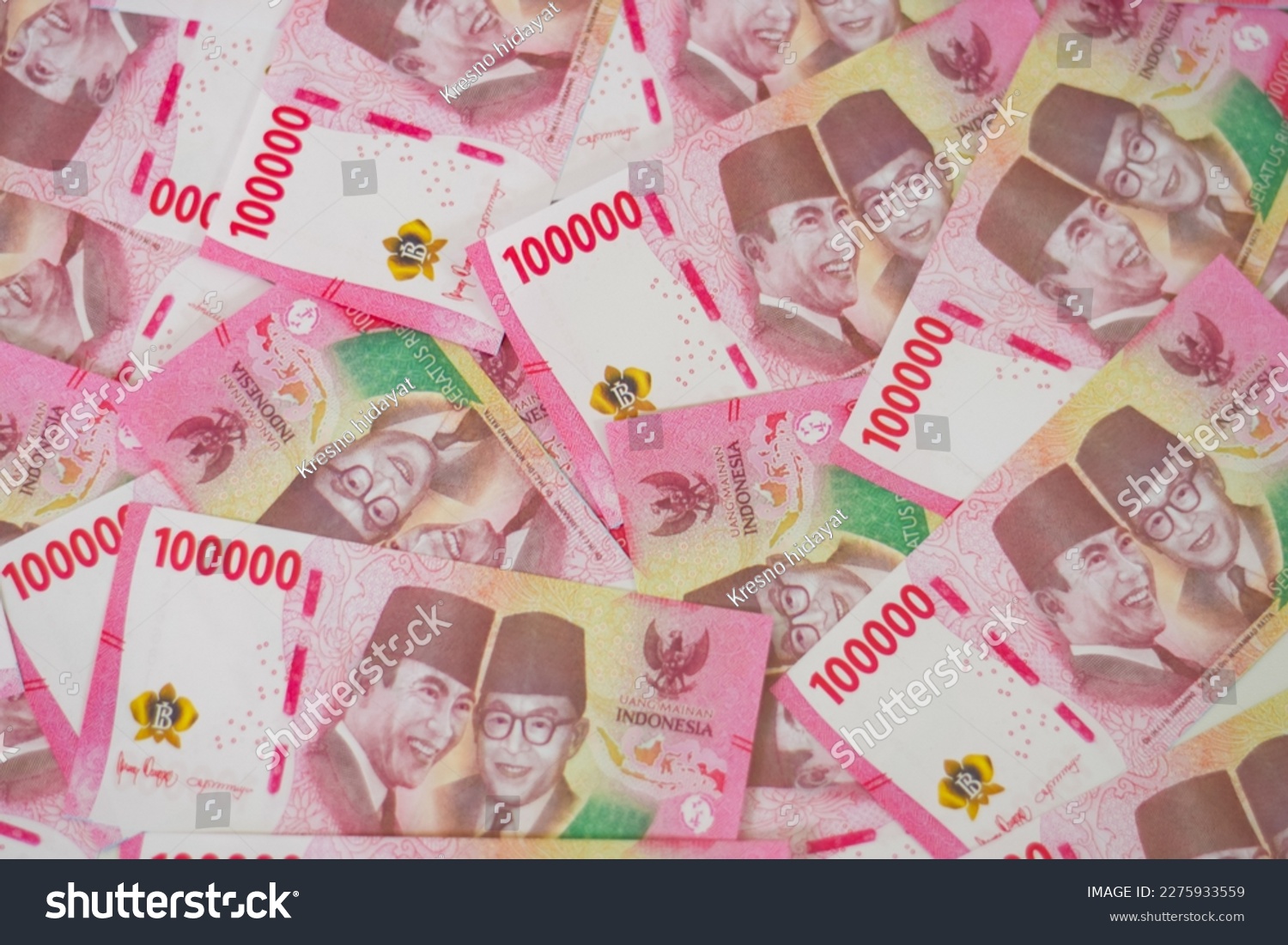 Indonesian rupiah banknotes series with the value of one hundred thousand rupiah IDR 100.000 issued since 2004, Indonesian rupiah for background

 #2275933559