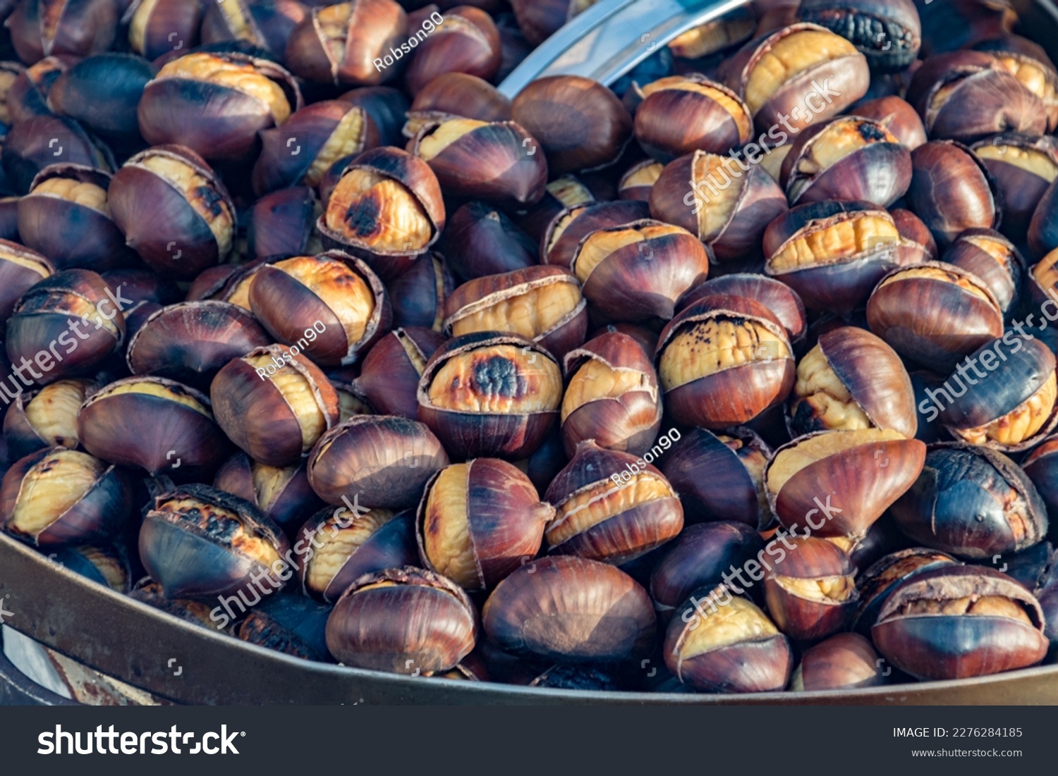 Eat roasted chestnuts. Roasted chestnuts for sale. #2276284185