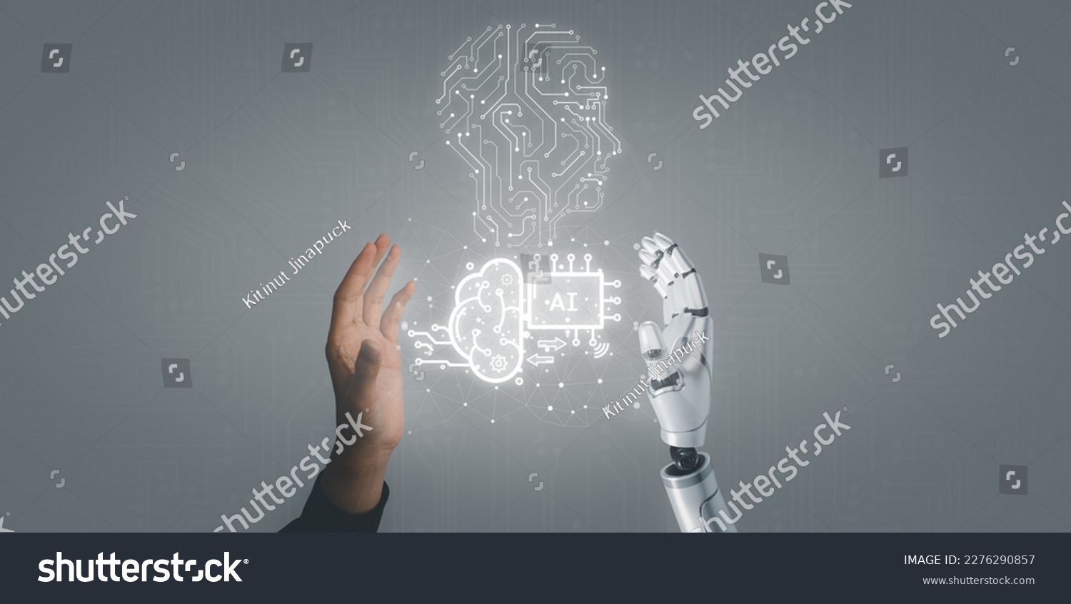 Business man and robot hand touch digital screen of AI icon artificial intelligence concept, big data, science, innovation technology, cloud computing, futuristic, internet network communication #2276290857