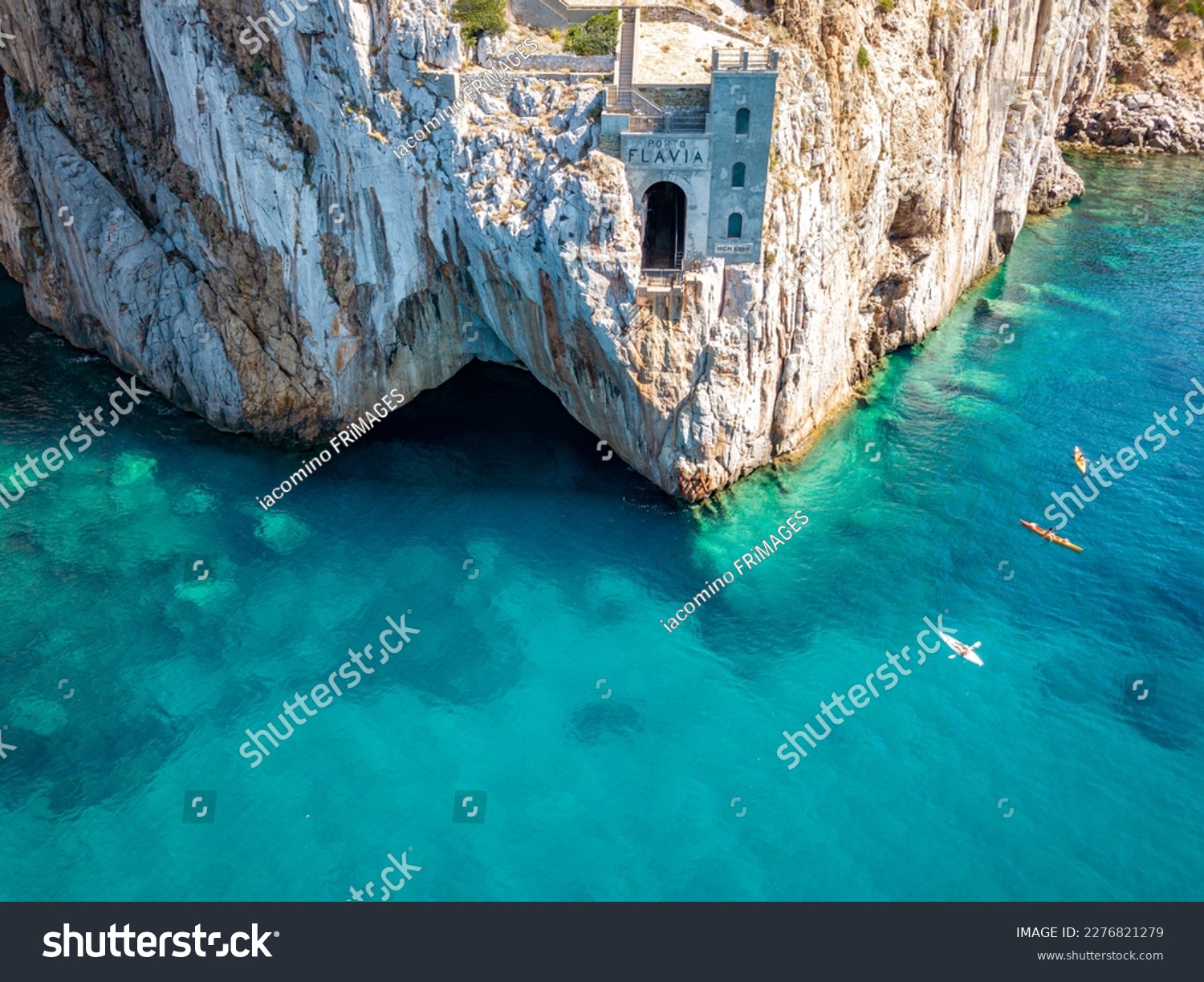 Aerial view of sea and coastline, Sardinia, Italy. Porto Flavia, kayaks #2276821279