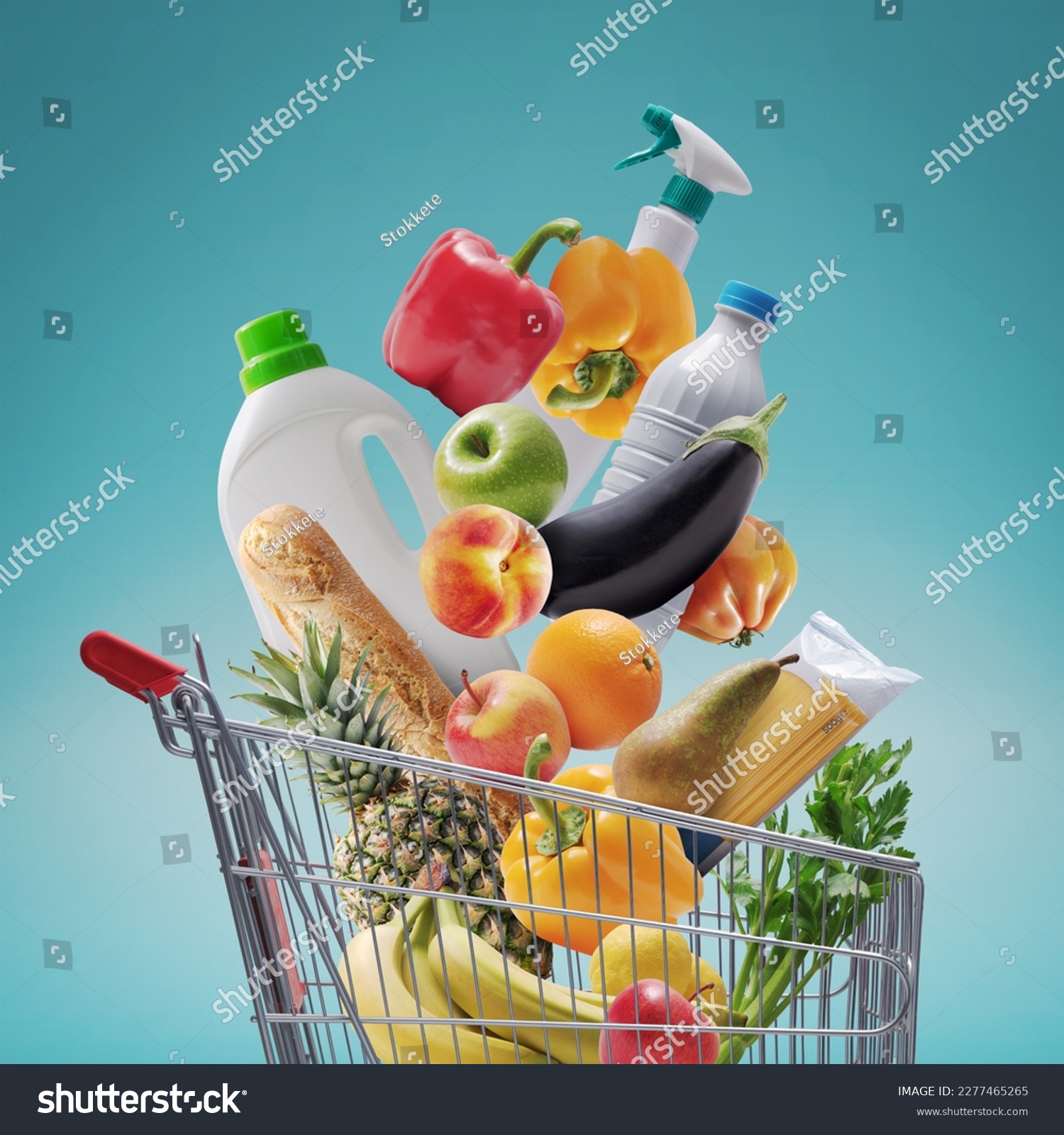 Fresh groceries and goods falling in a supermarket trolley, grocery shopping concept #2277465265