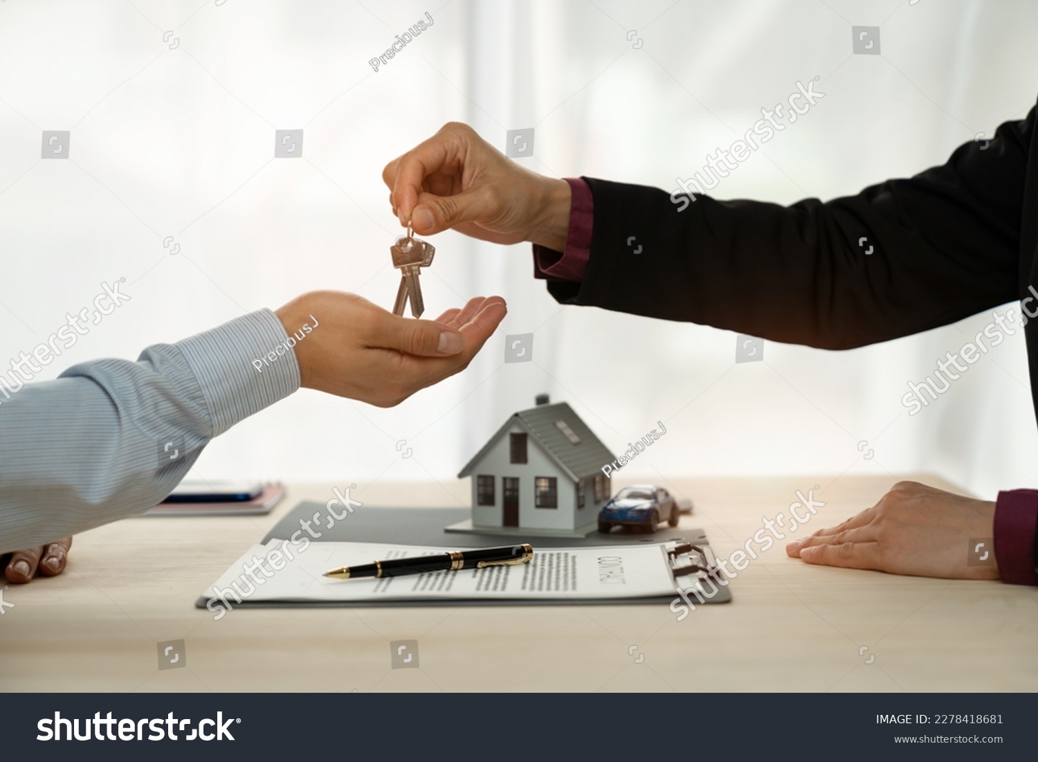 Businessman, insurance sales agent handing over house and car keys to customer in trading or renting in mutual agreement at security concept office housing investment. #2278418681