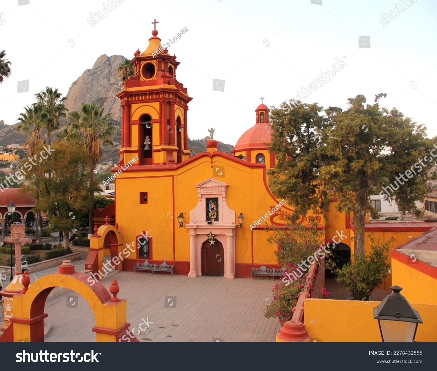 Magical town Peña de Bernal in Queretaro Mexico in the center The Temple of San Sebastian is located in the Main Square surrounded by gardens #2278432555