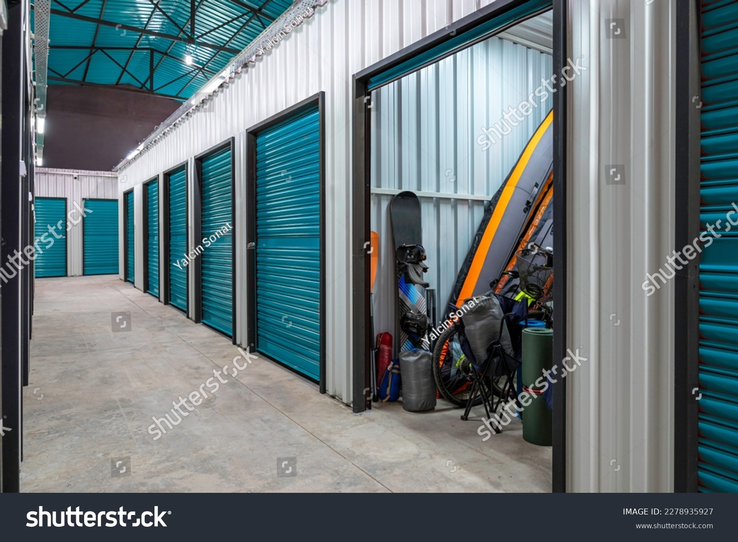 Outdoors activity items seen through the open door of the self storage unit. Rental Storage Units #2278935927