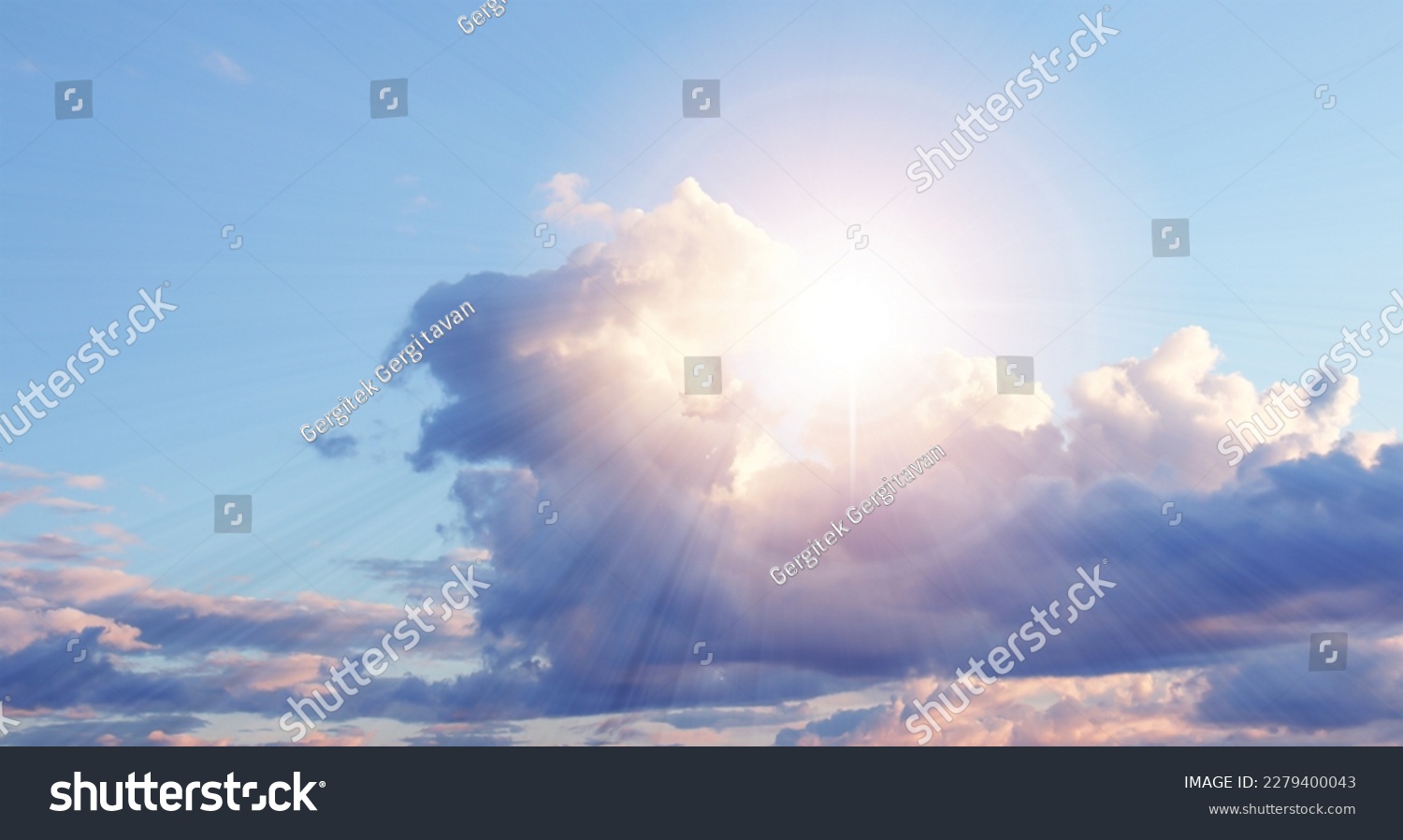Morning sun shining through the clouds in the beautiful blue sky. nature landscape background #2279400043