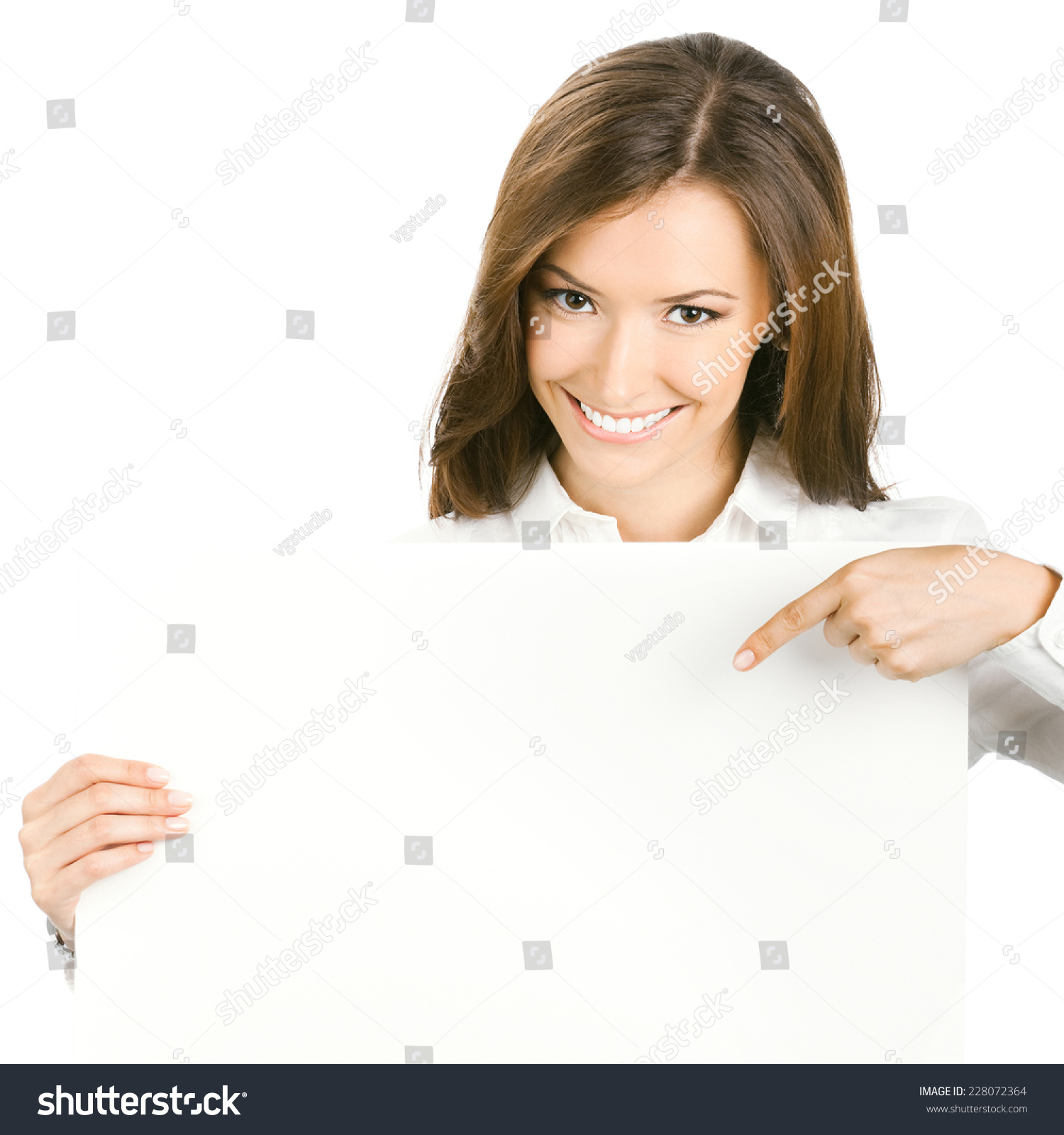 Happy smiling beautiful young business woman showing blank signboard, isolated over white background #228072364