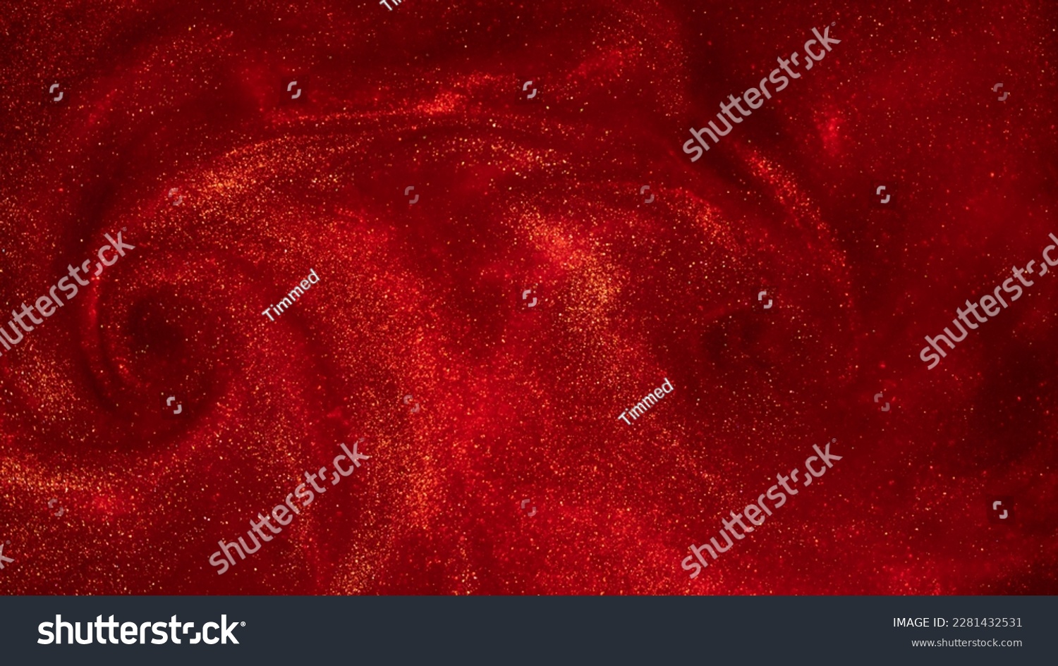Magic sparkling glitter in red background. Golden dust particles create curve patterns with depth of field on red background. Golden Particles in red fluid absatrct backdrop. #2281432531