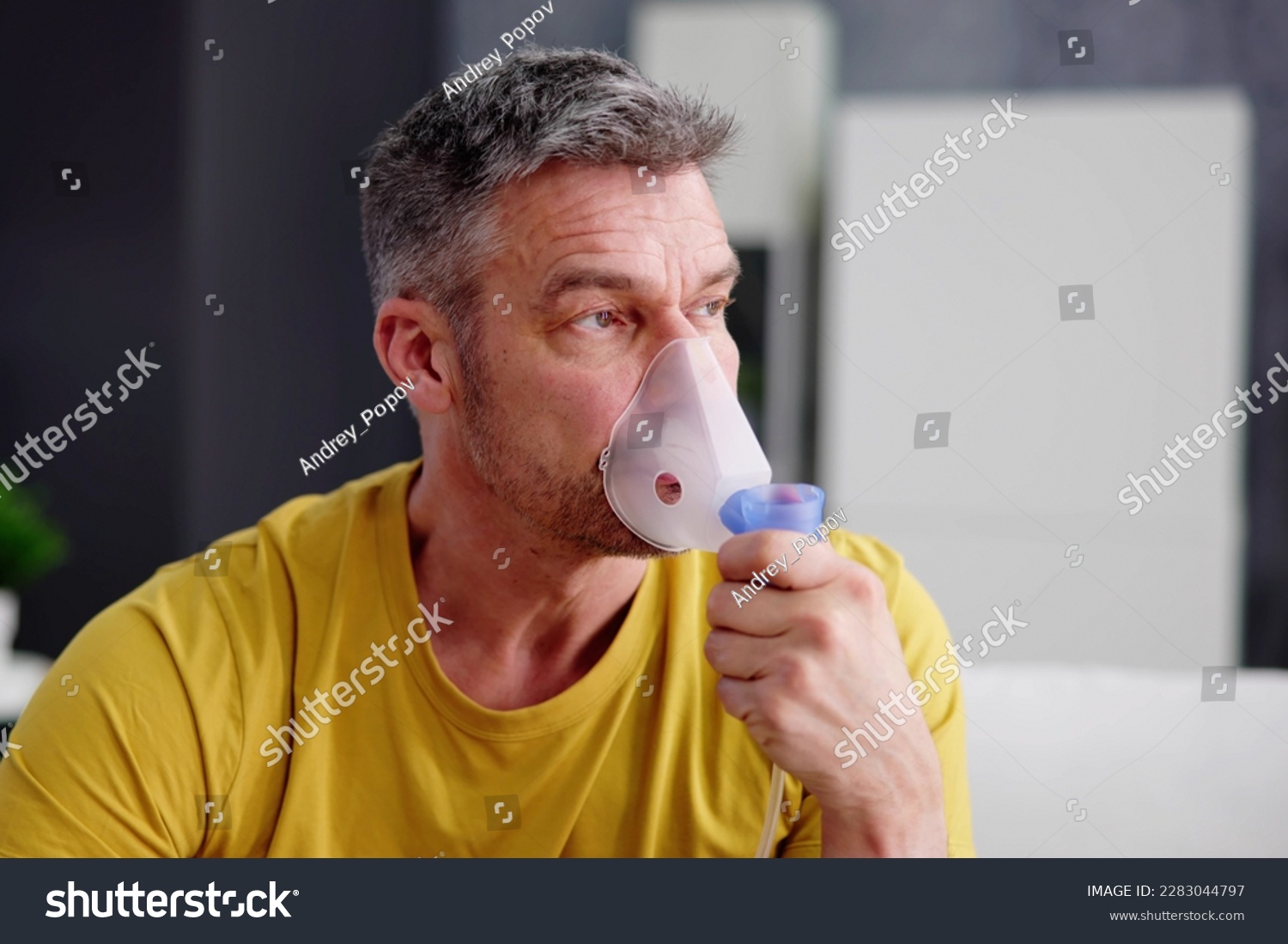 Asthma Patient Breathing Using Oxygen Mask And COPD Nebulizer #2283044797