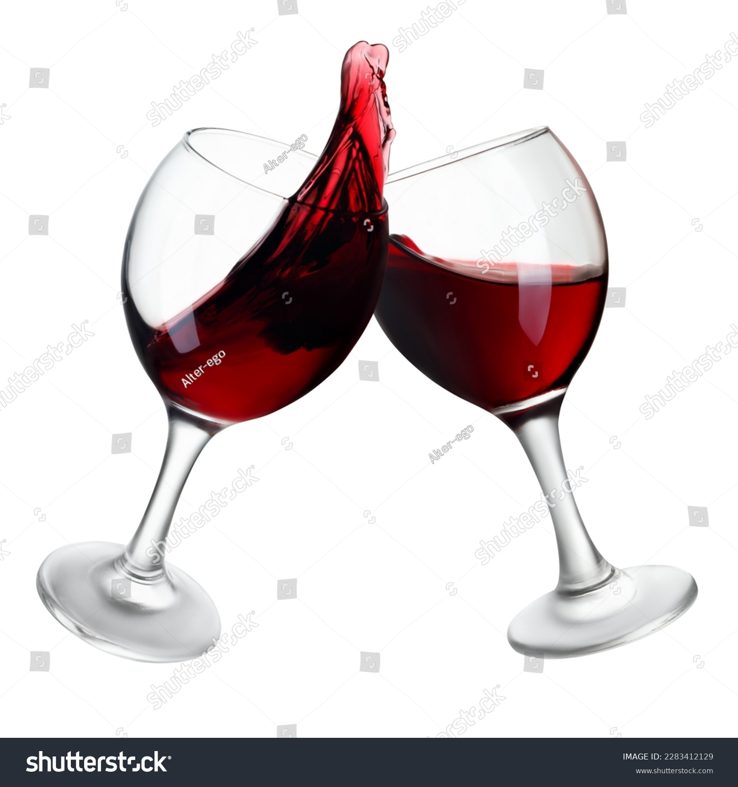 two glasses of red wine making toast with splash isolated on white background #2283412129