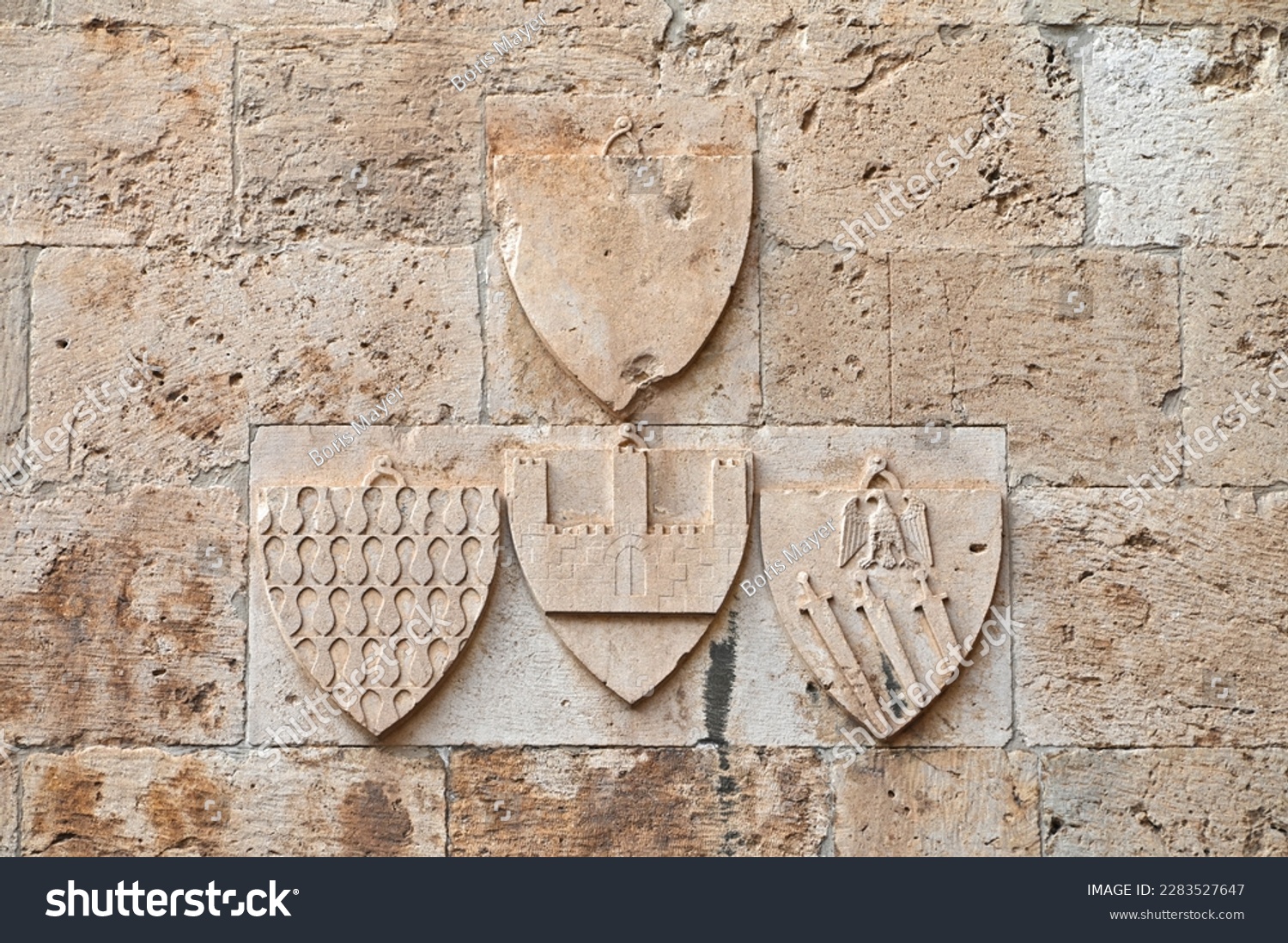 Heraldic symbols, coat of arms, at the Elephant Tower, in the historic city center of Cagliari, Sardinia, Italy #2283527647