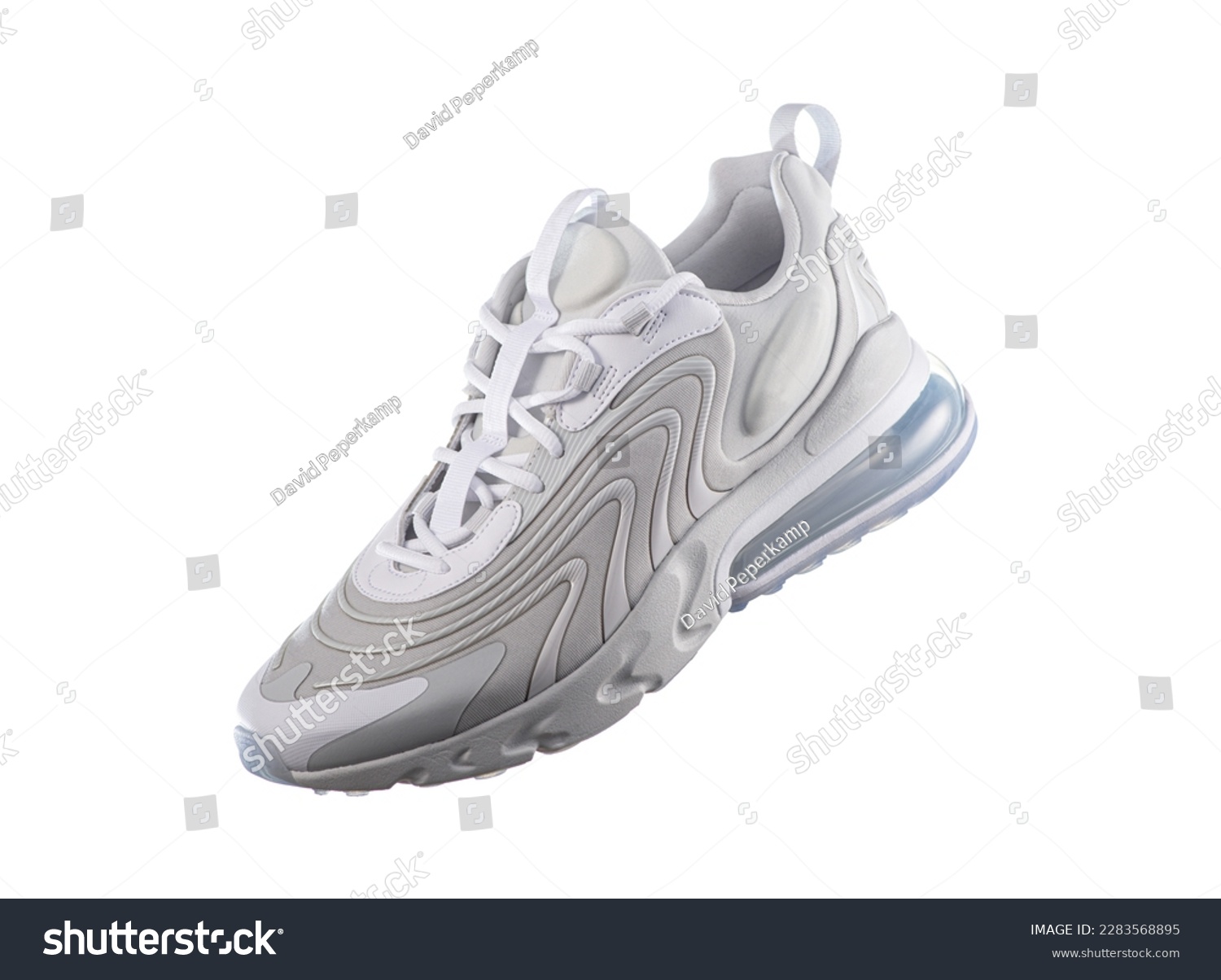 White sneaker with light blue accents on a white isolated background, sport concept, men's fashion, sport shoe, air, sneakers, lifestyle, concept, product photo, levitation concept, street  #2283568895
