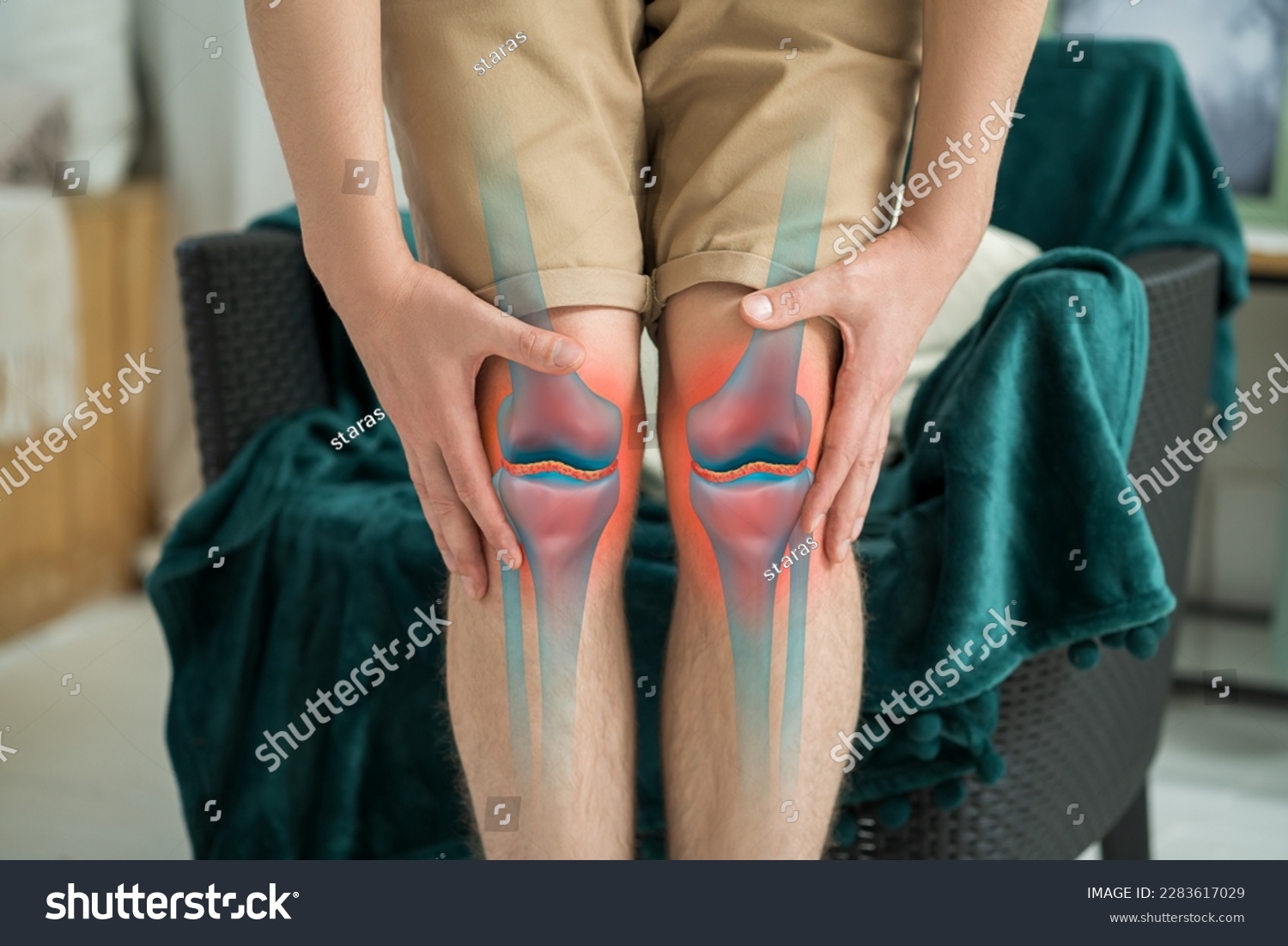 Knee pain, man suffering from osteoarthritis at home, chiropractic treatments concept #2283617029