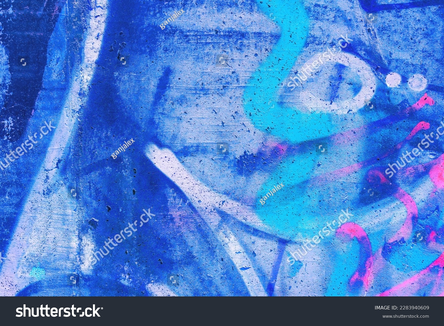Closeup of colorful pink, purple, blue urban wall texture. Modern pattern for wallpaper design. Creative modern urban city background for advertising mockups. Grunge messy street style background #2283940609
