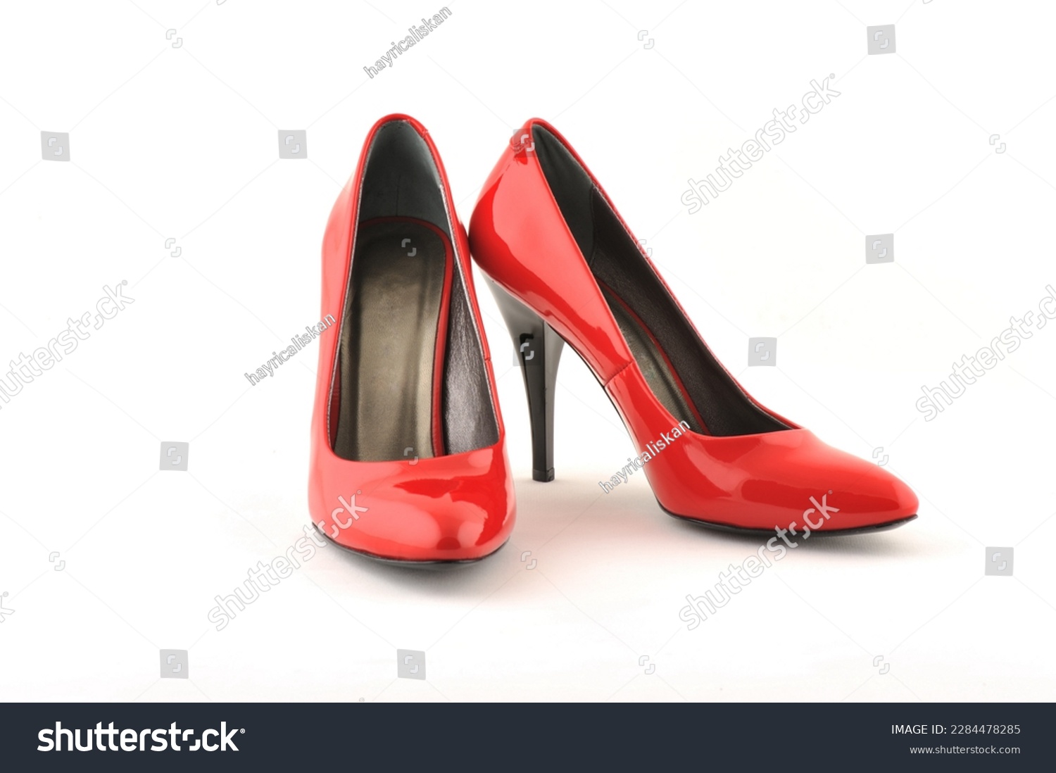Red high heel shoes isolated on white background, clipping path included. #2284478285