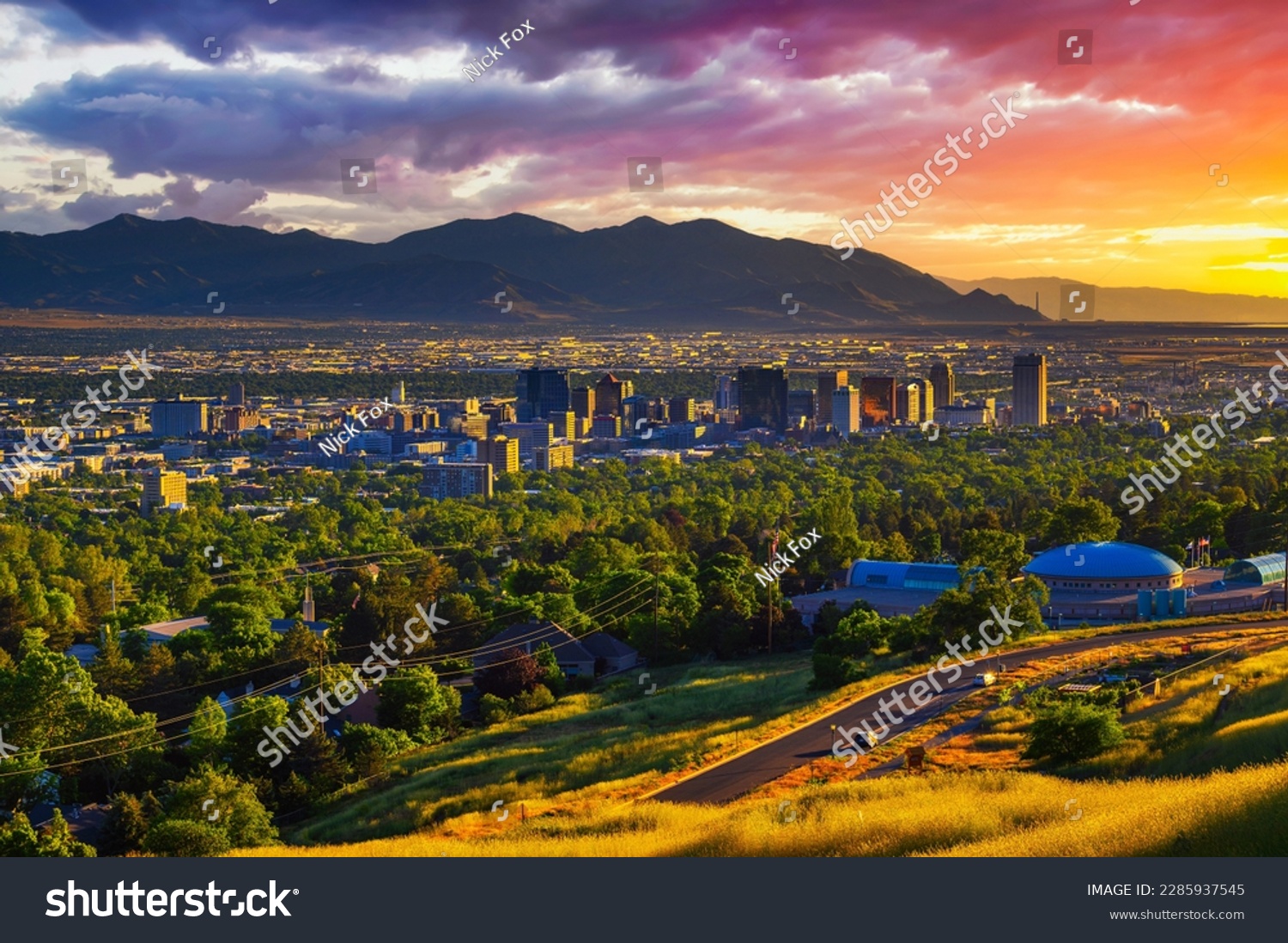 Salt Lake City skyline at sunset with Wasatch Mountains in the background, Utah, USA. #2285937545