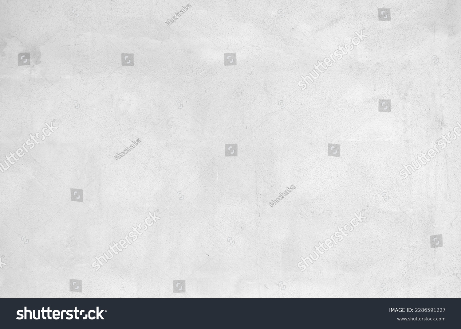 White cement wall in retro concept. Old concrete background for wallpaper or graphic design. Blank plaster texture in vintage style. Modern house interiors that feel calm and simple. #2286591227