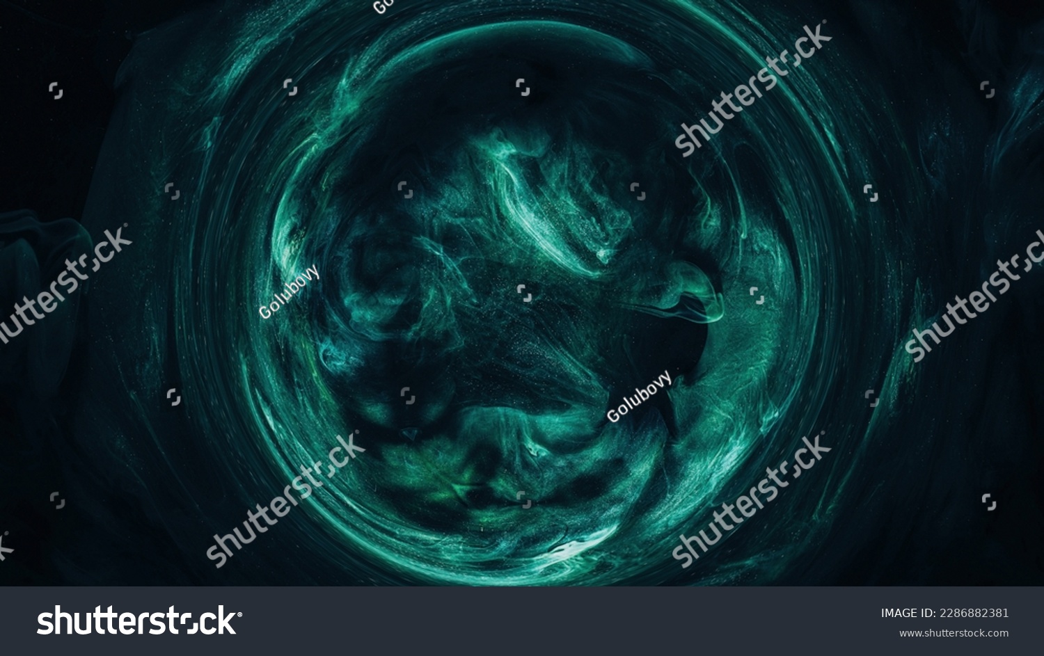 Mist circle. Round frame. Mystic vortex. Green blue color glowing sparkling glitter particles in smoke swirl on dark black abstract background. #2286882381