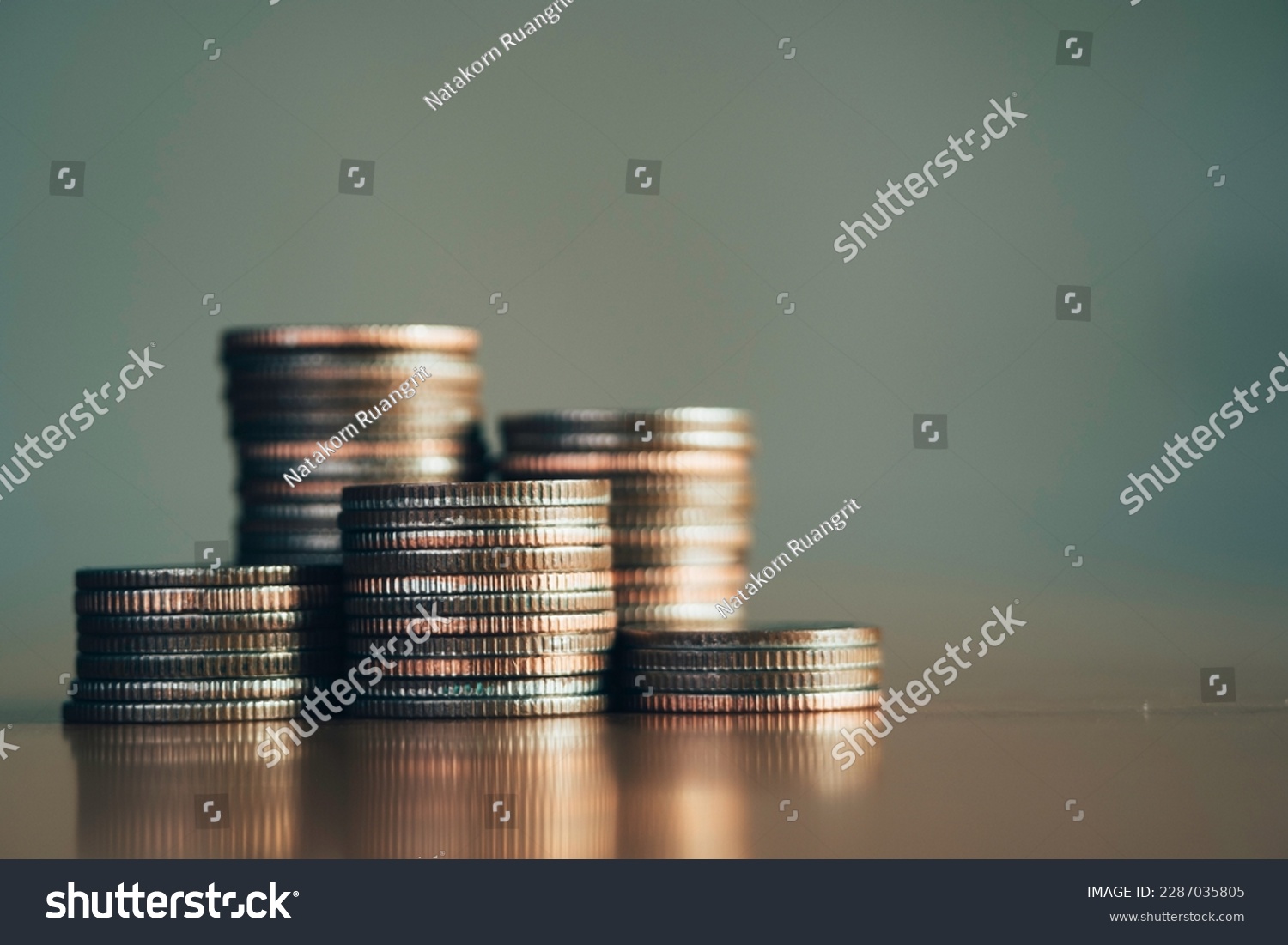 close-up of the coins stack for a financial business presentation background, home loan, money saving, stock and fund management, retirement plan concept, business growth, profit, selective focus #2287035805