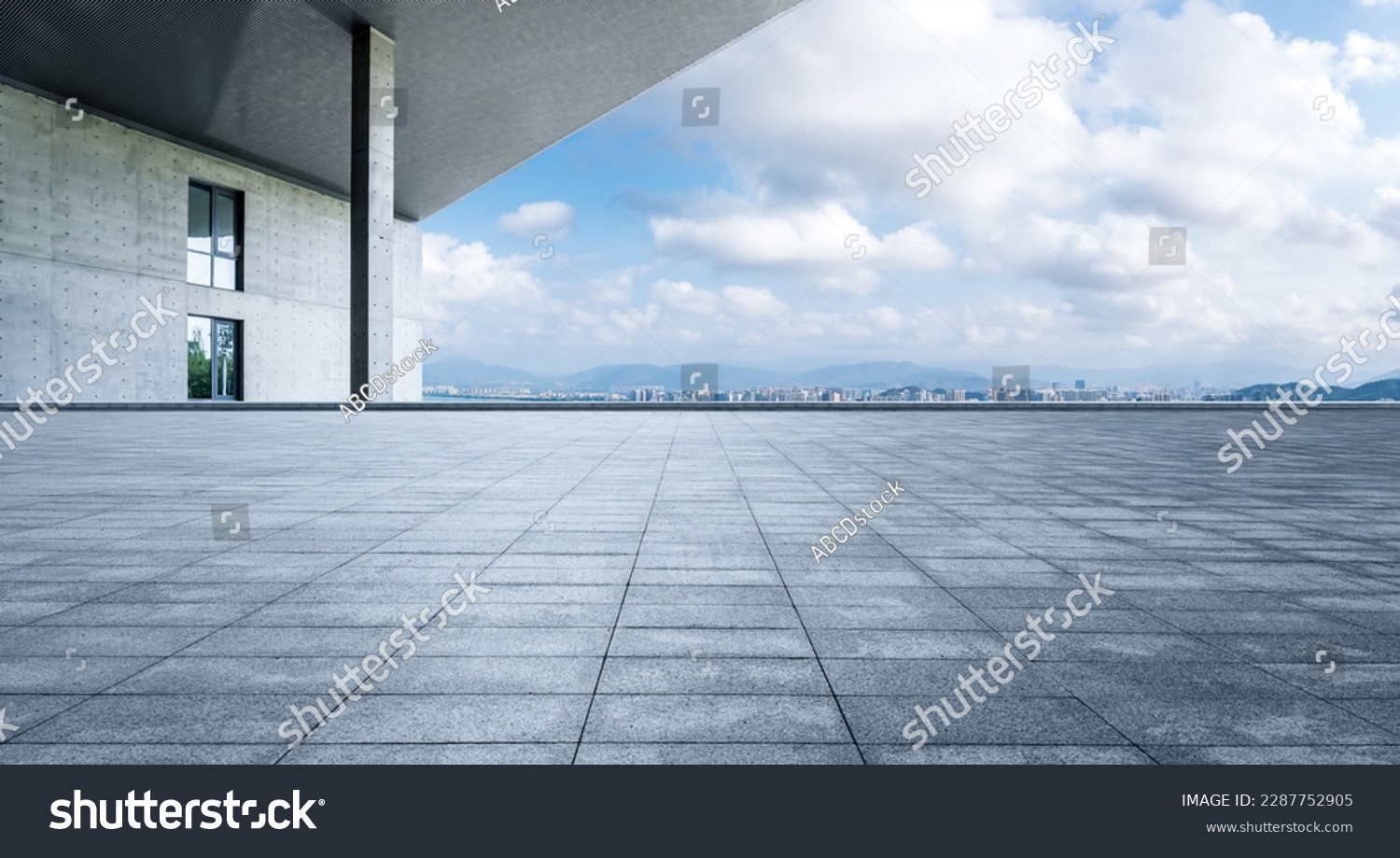 Empty square floor and city skyline with building background #2287752905
